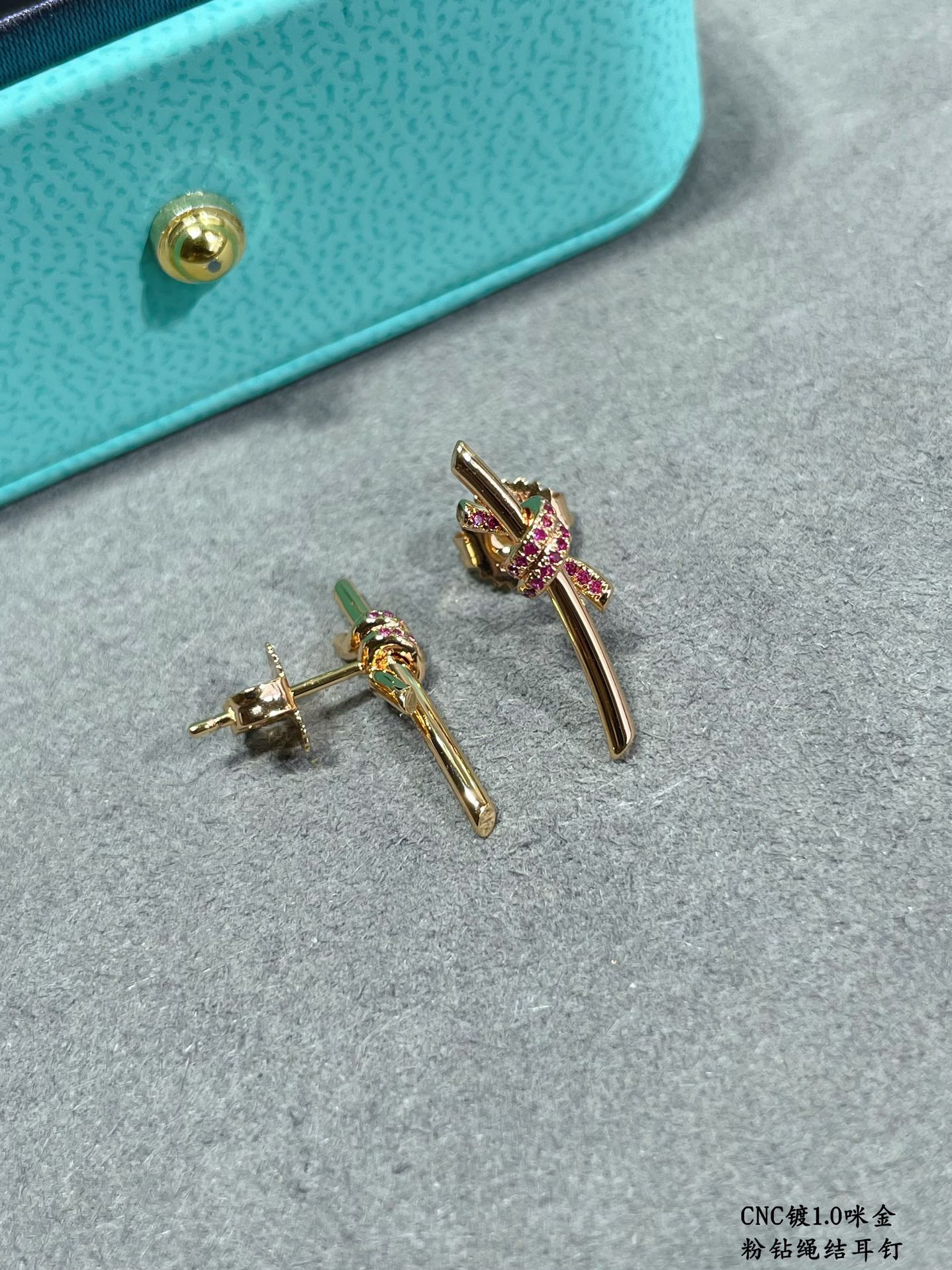 t*f*ny & co. pink Di*m*nd t wire knot stud earrings