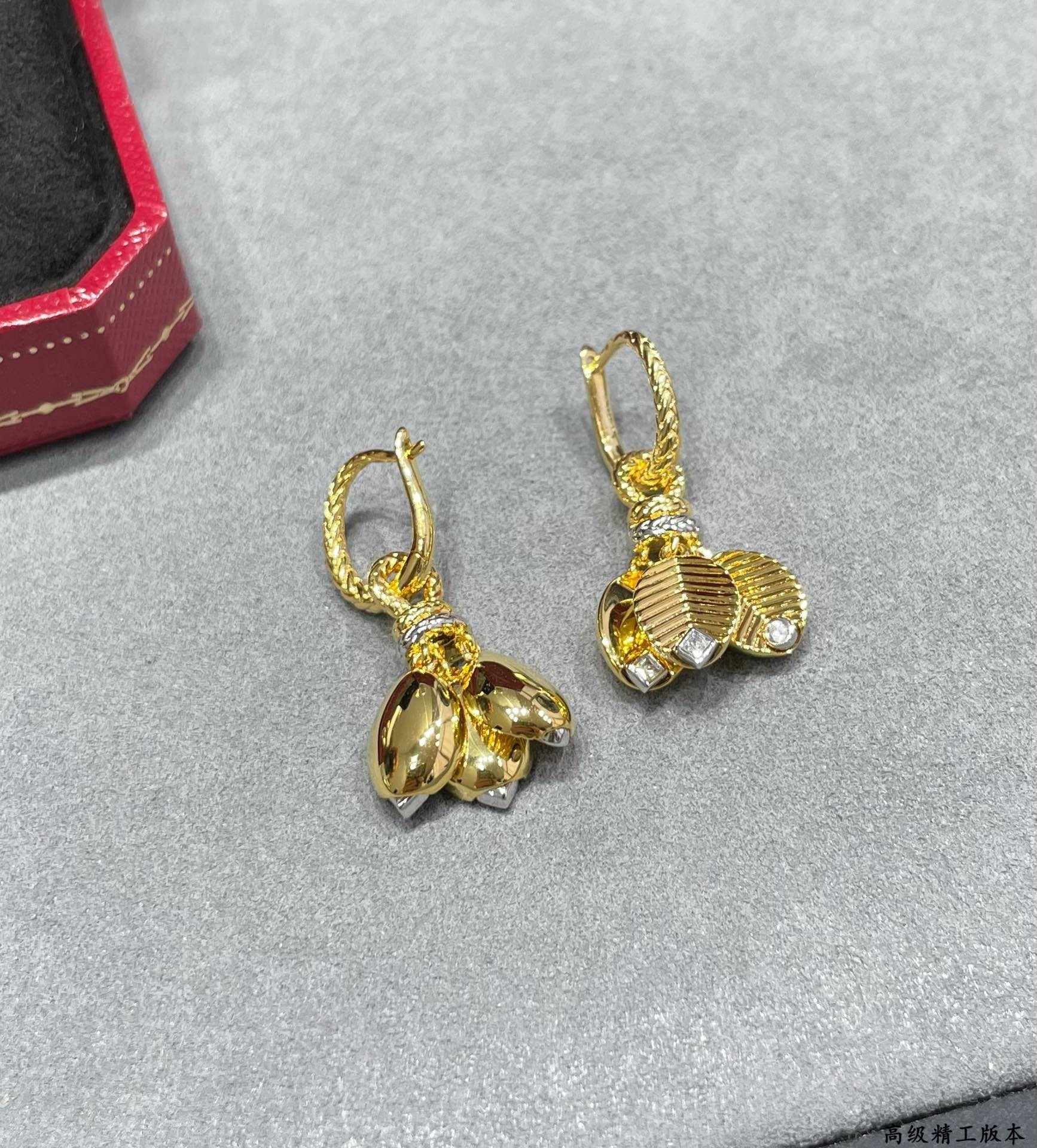 Ca*t*er coffee bean leaf earrings