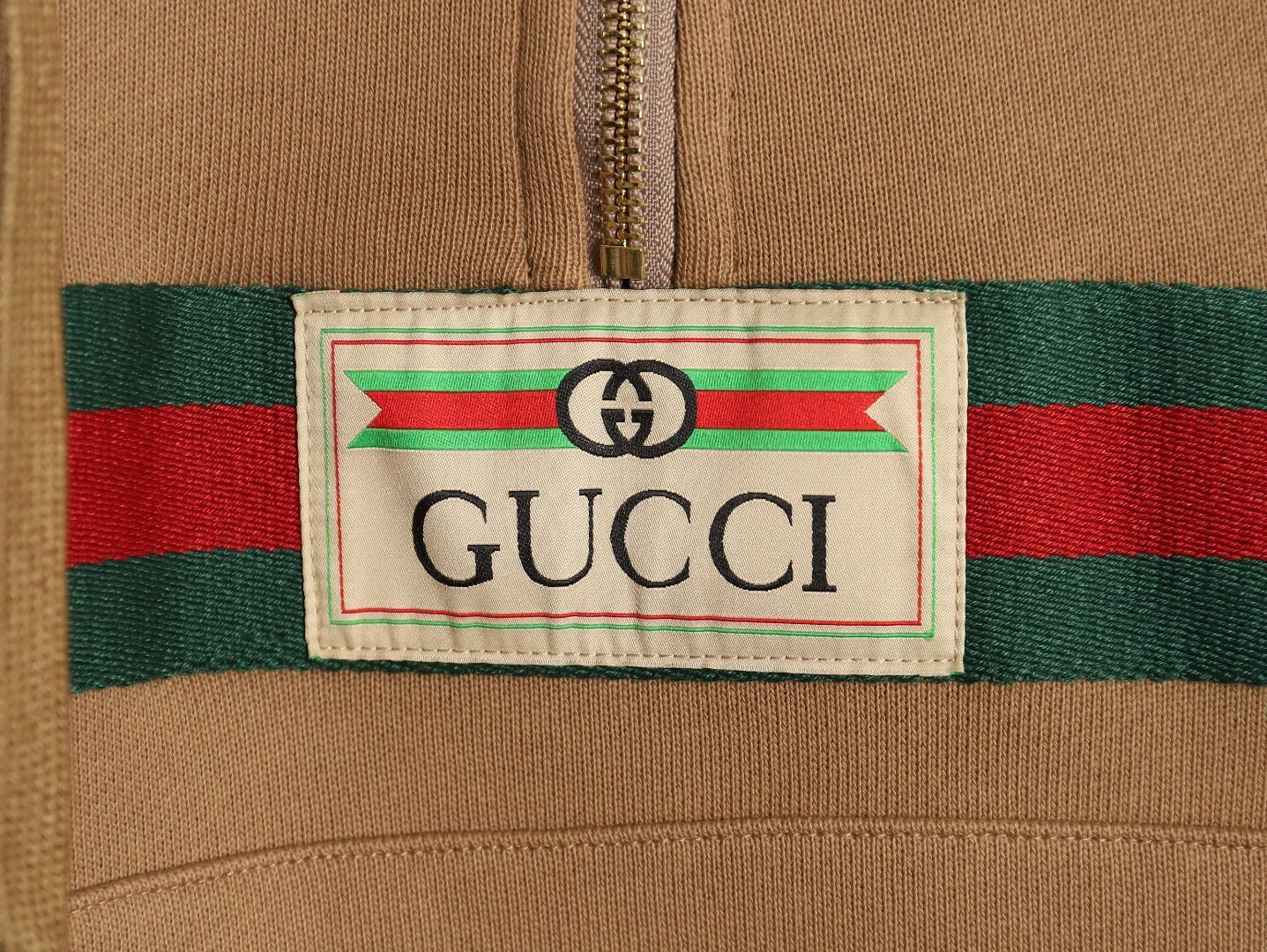 G*u*i hoodies
