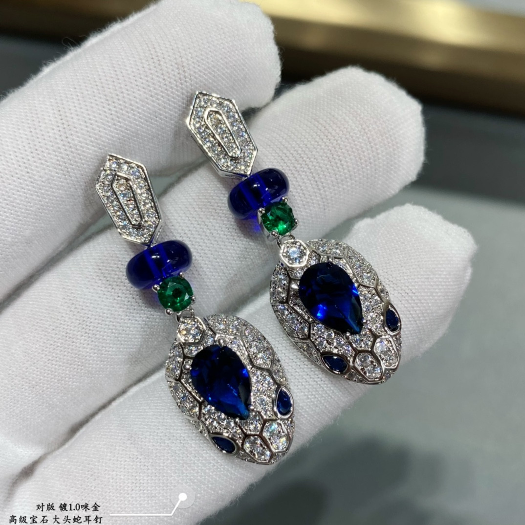 B*l*ai big head snake earrings