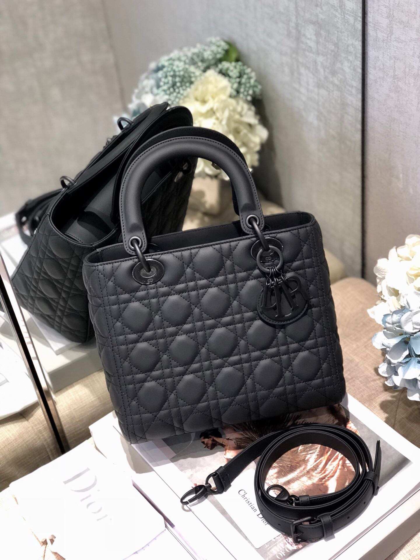 medium lady D*or bag 9.5 x 8 x 4.5 inches