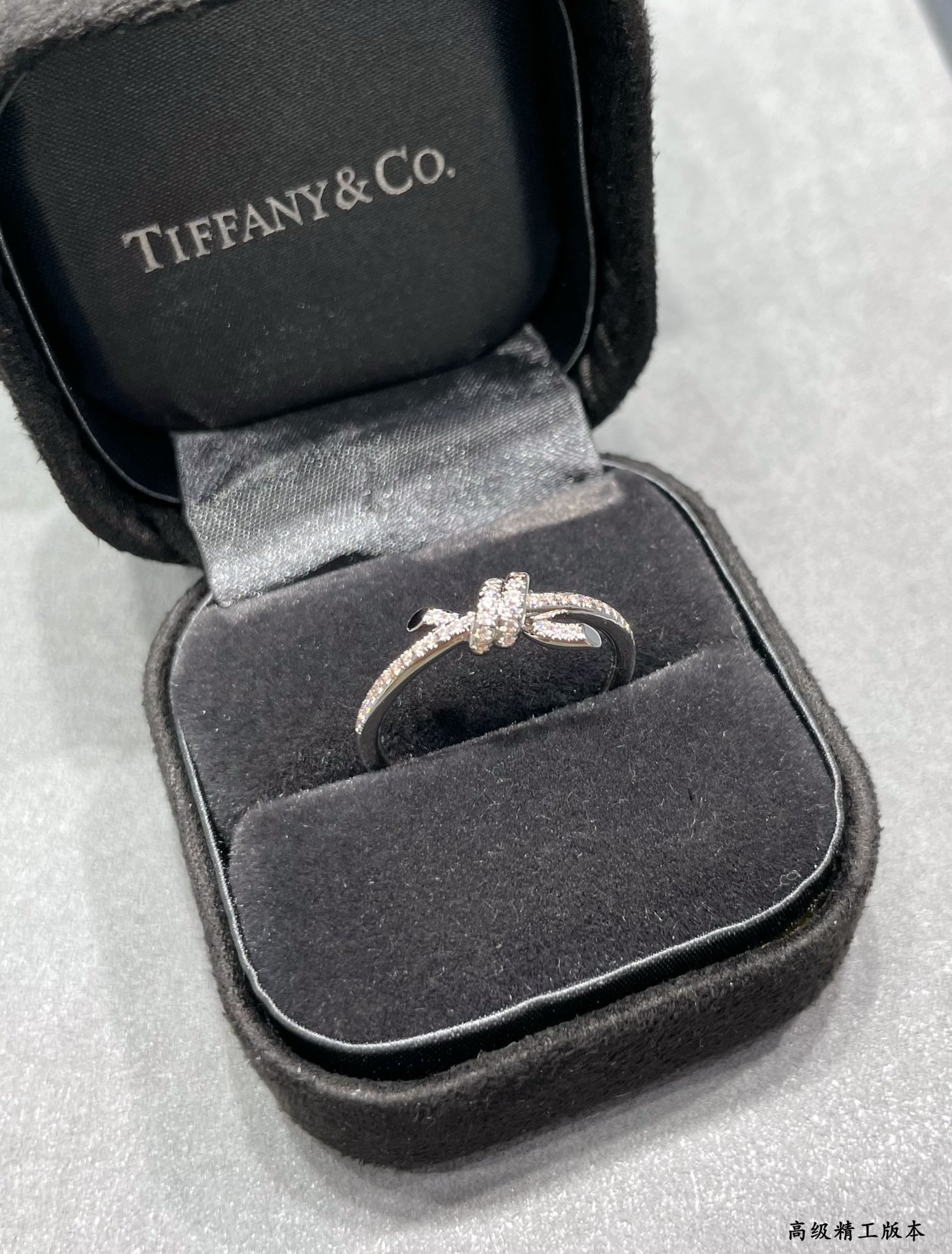 t*f*ny & co. half-halo Di*m*nd knot ring