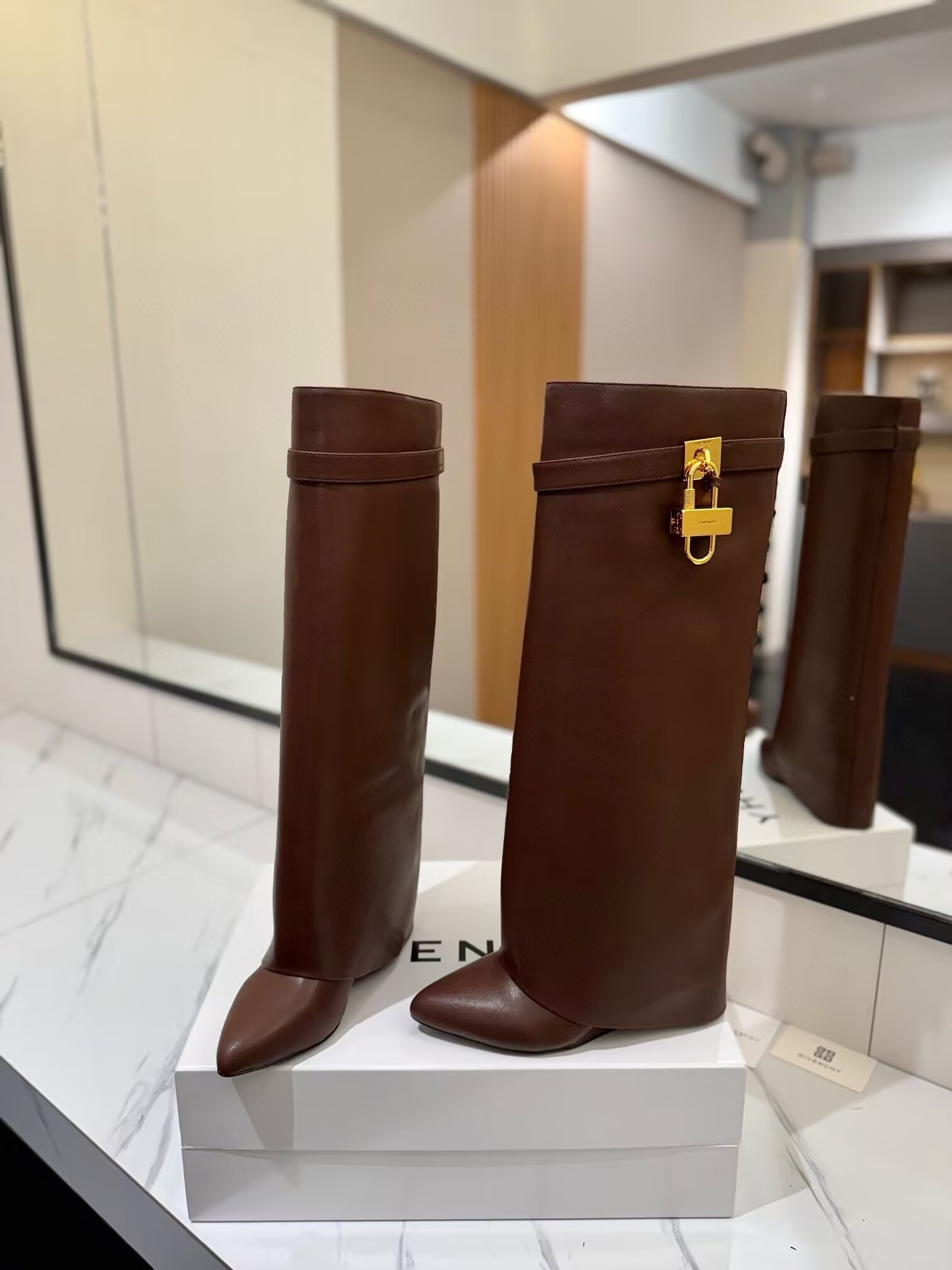 UA Givenchy Shark Lock boots in leather