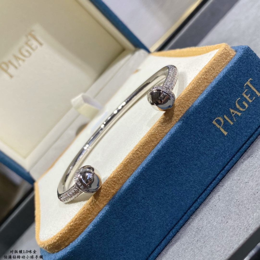 piaget fully Di*m*nd-encrusted rotating ball bracelet
