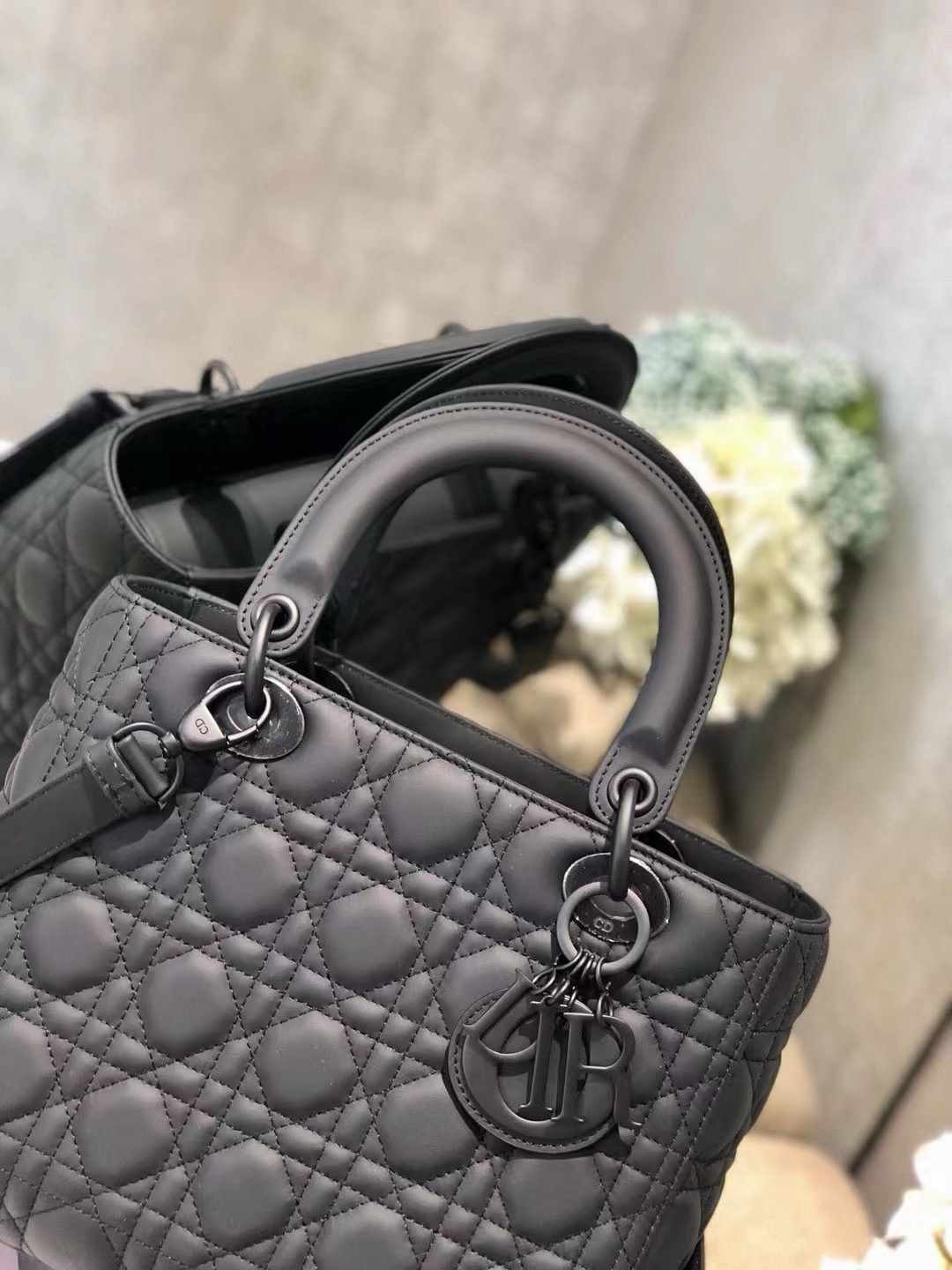 medium lady D*or bag 9.5 x 8 x 4.5 inches