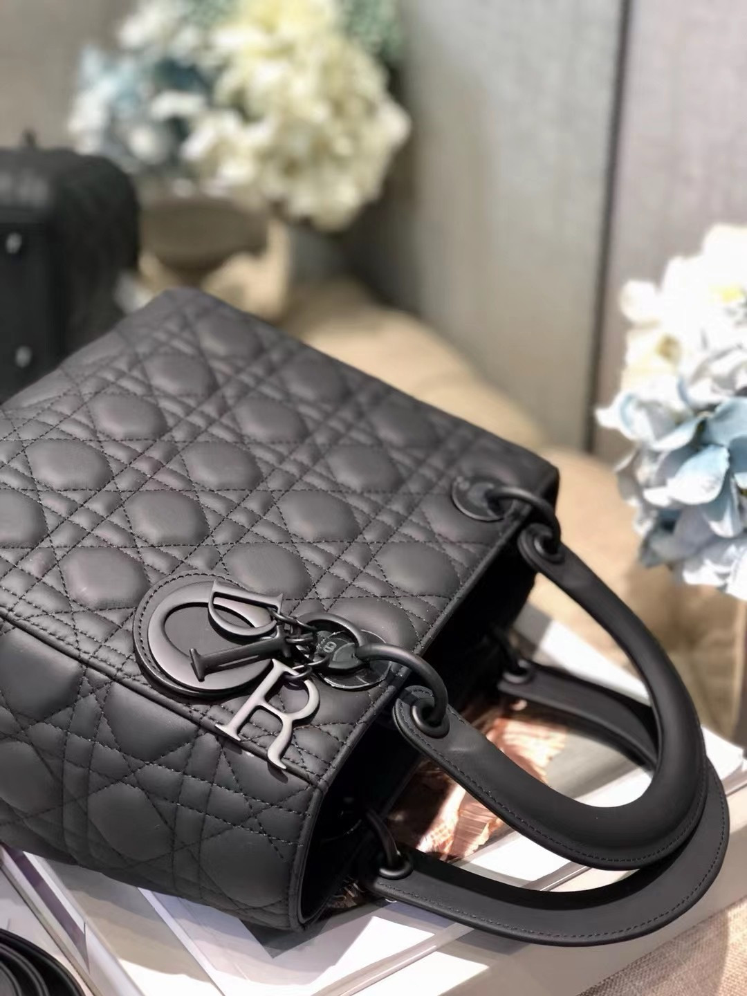 medium lady D*or bag 9.5 x 8 x 4.5 inches