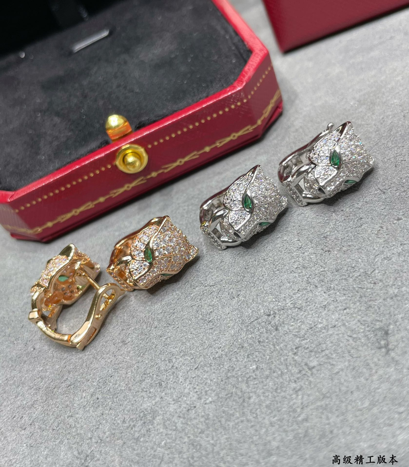 Ca*t*er leopard head earrings