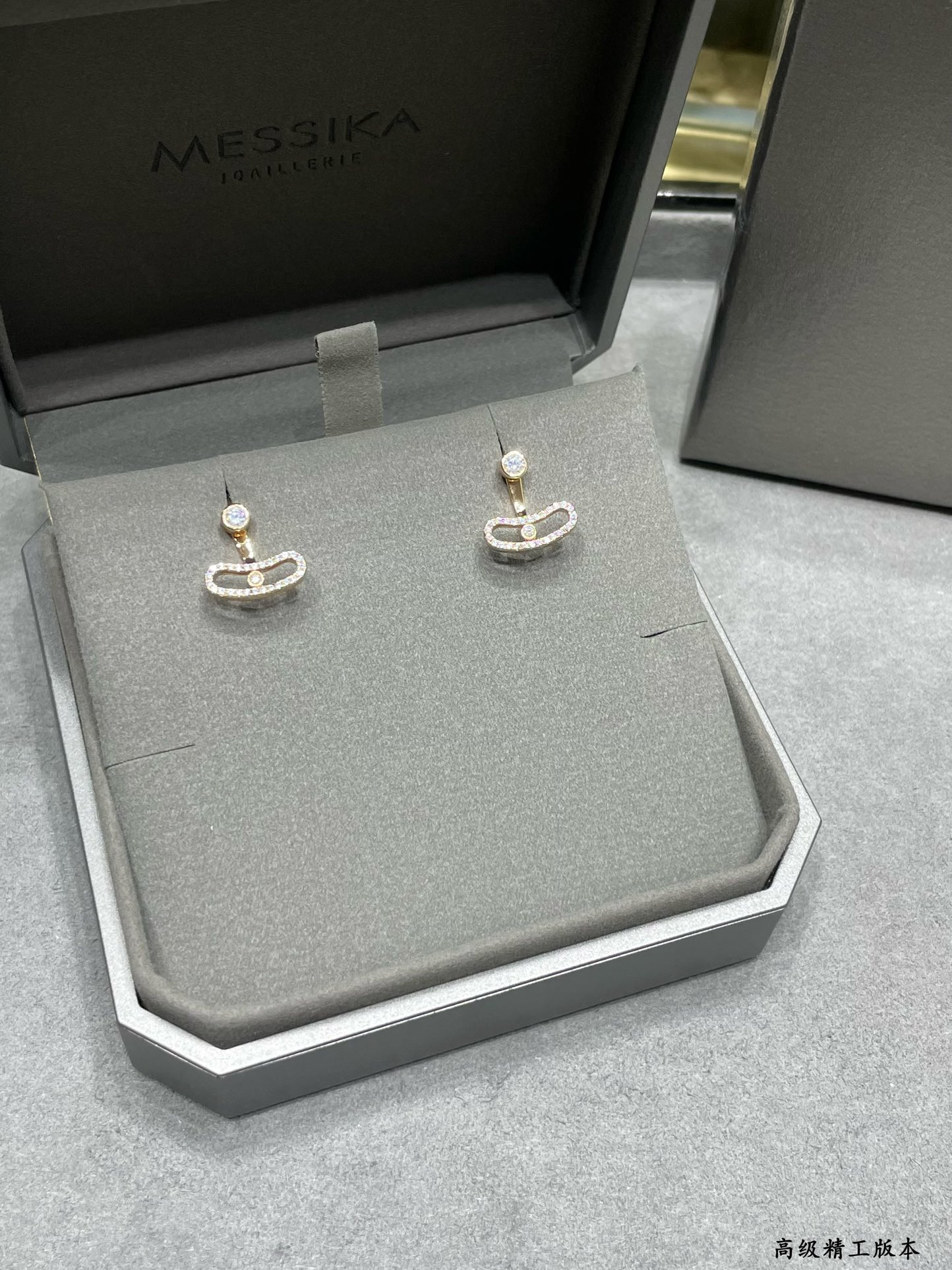 messika curved single Di*m*nd stud earrings