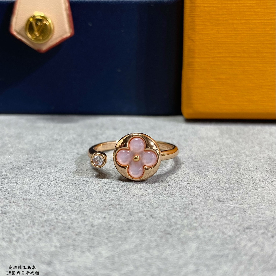 l0*is V*t0n round mother-of-pearl ring