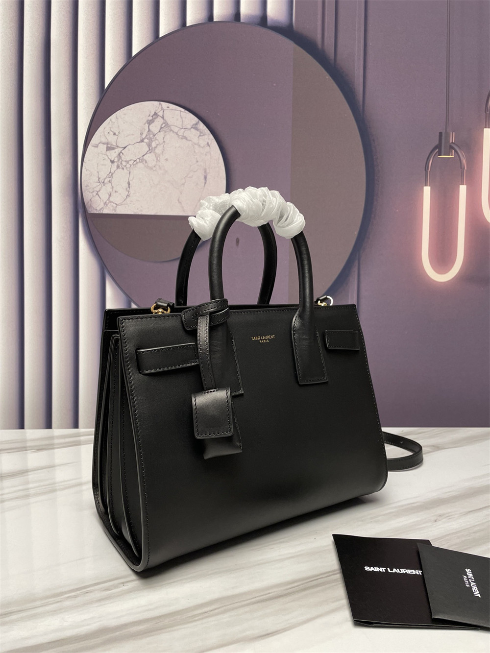 Y*L sac de jour baby in shiny leather black