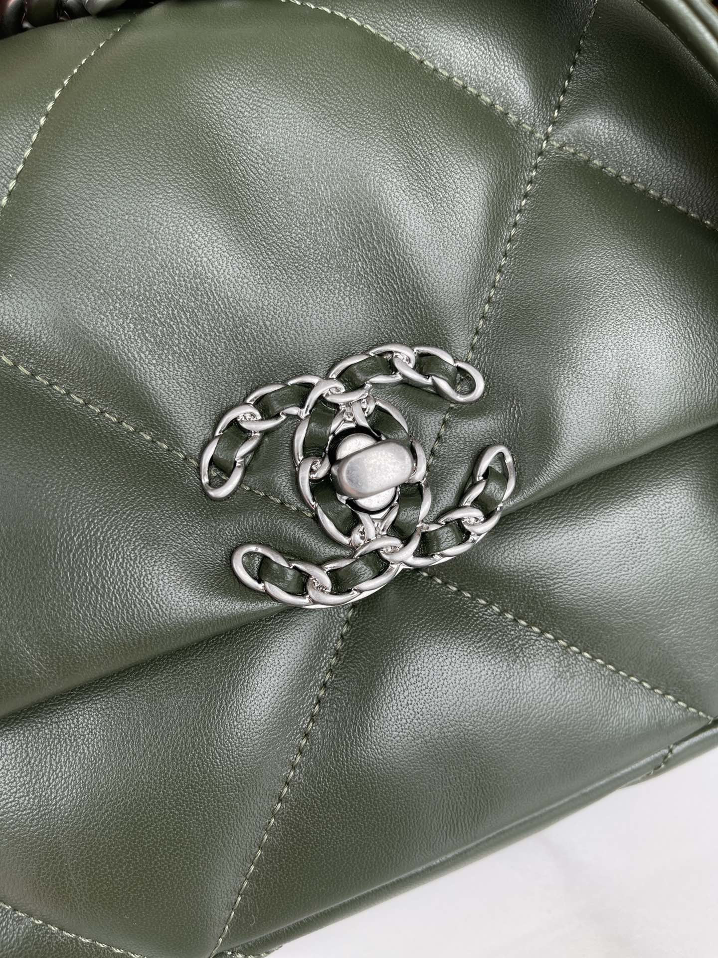 Ch*el 19 handbag shiny leather, gold-tone, silver-tone & ruthenium-finish metal dark green 6.2 × 10.1 × 3.5 in