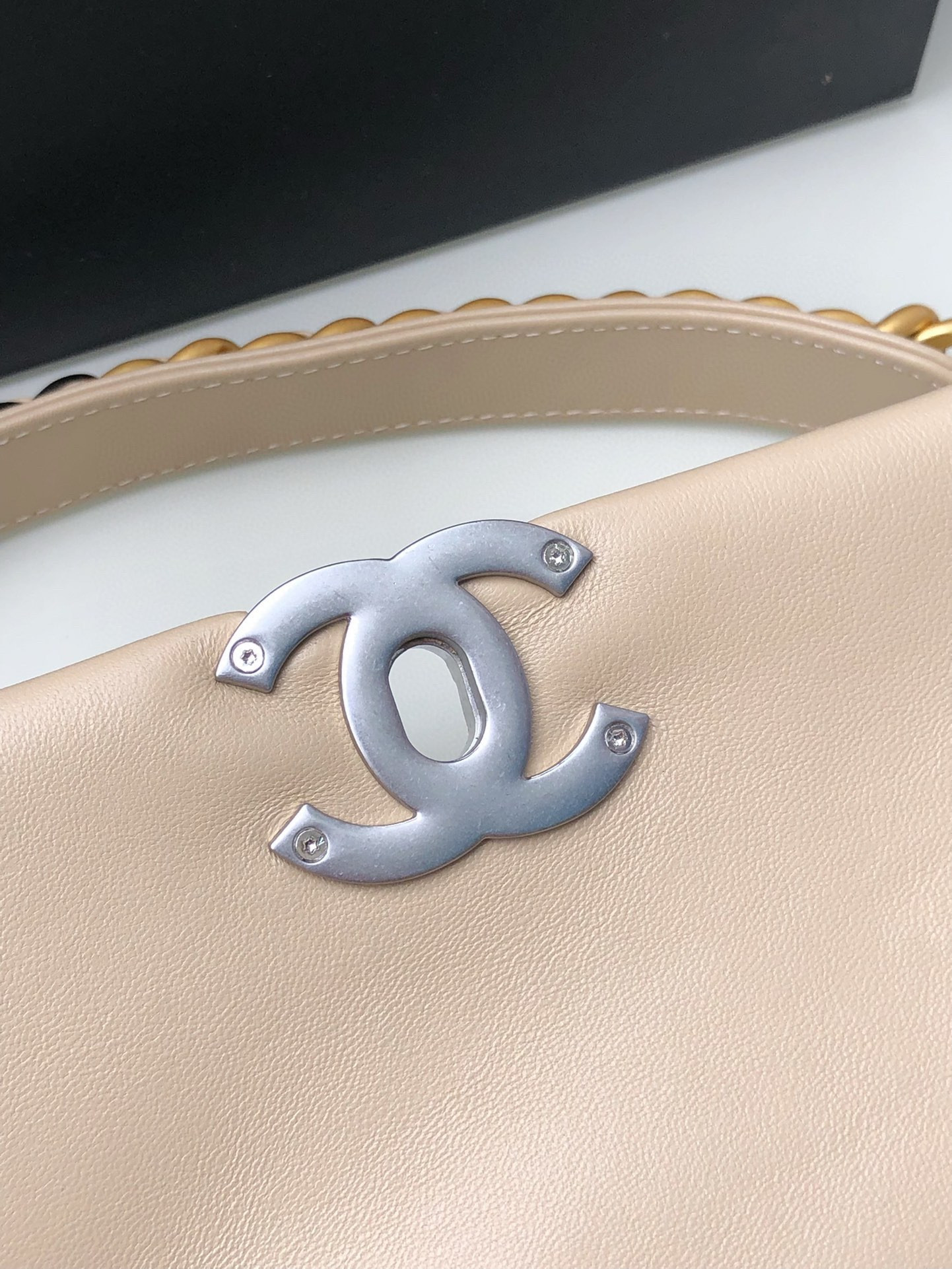 Ch*el 19 handbag shiny leather, gold-tone, silver-tone & ruthenium-finish metal beige 30x20x10cm