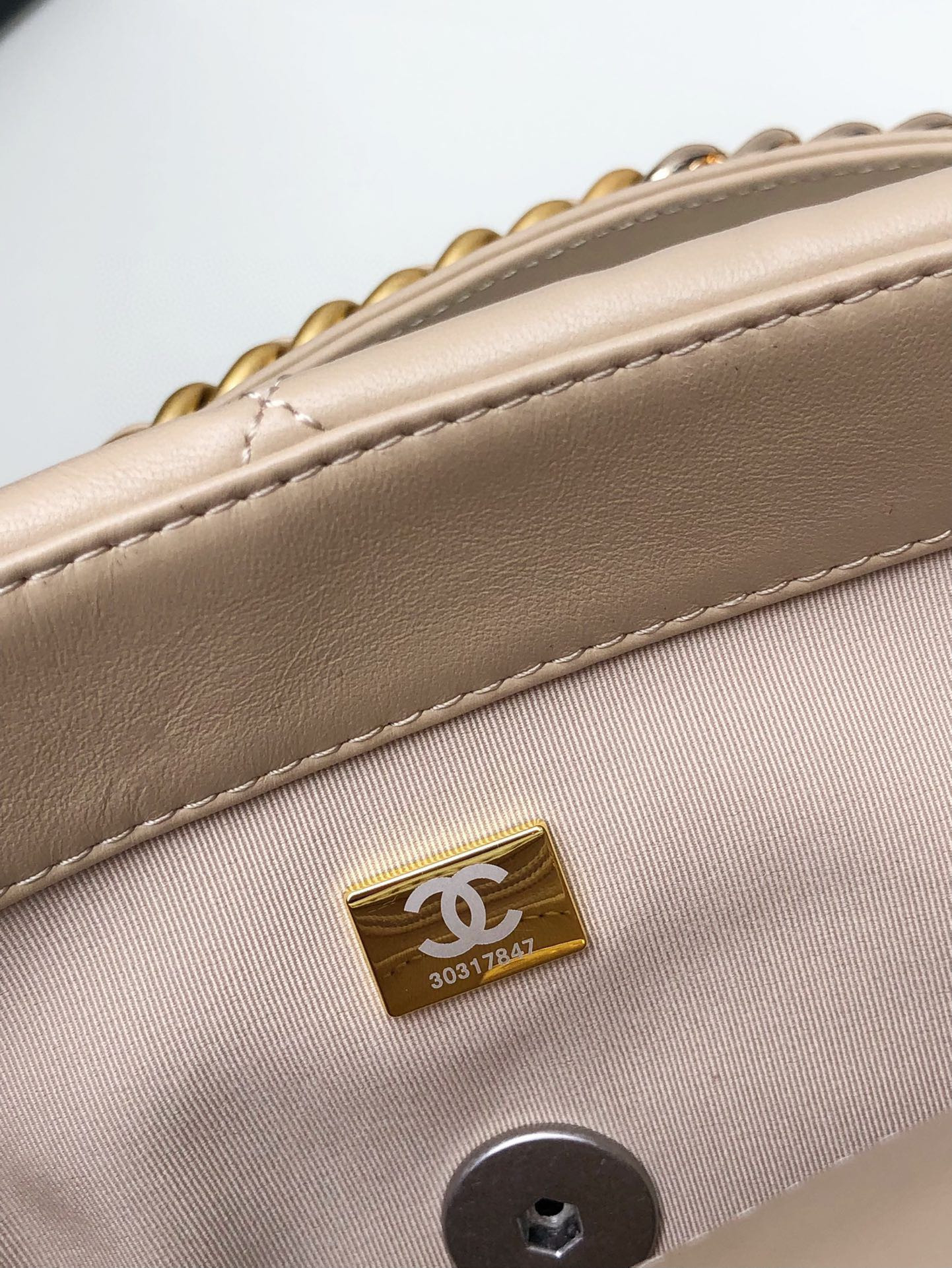 Ch*el 19 handbag shiny leather, gold-tone, silver-tone & ruthenium-finish metal beige 30x20x10cm
