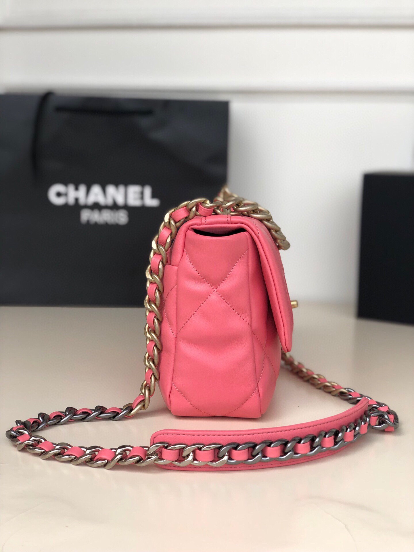 Ch*el 19 handbag shiny leather, gold-tone, silver-tone & ruthenium-finish metal pink 6.2 × 10.1 × 3.5 in