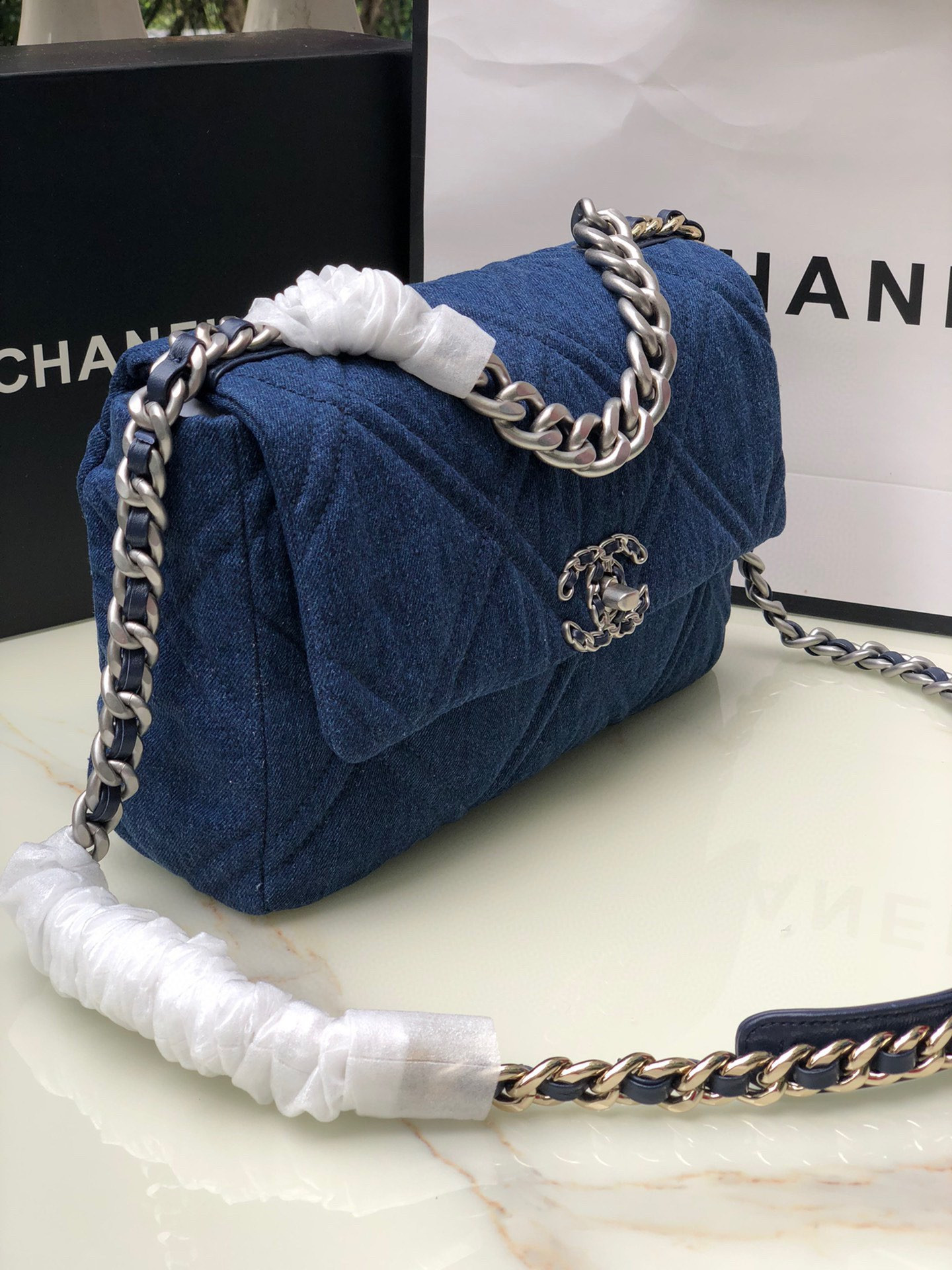 Ch*el 19 large handbag, gold-tone, silver-tone & ruthenium-finish metal blue 7.8 × 11.7 × 3.9 in