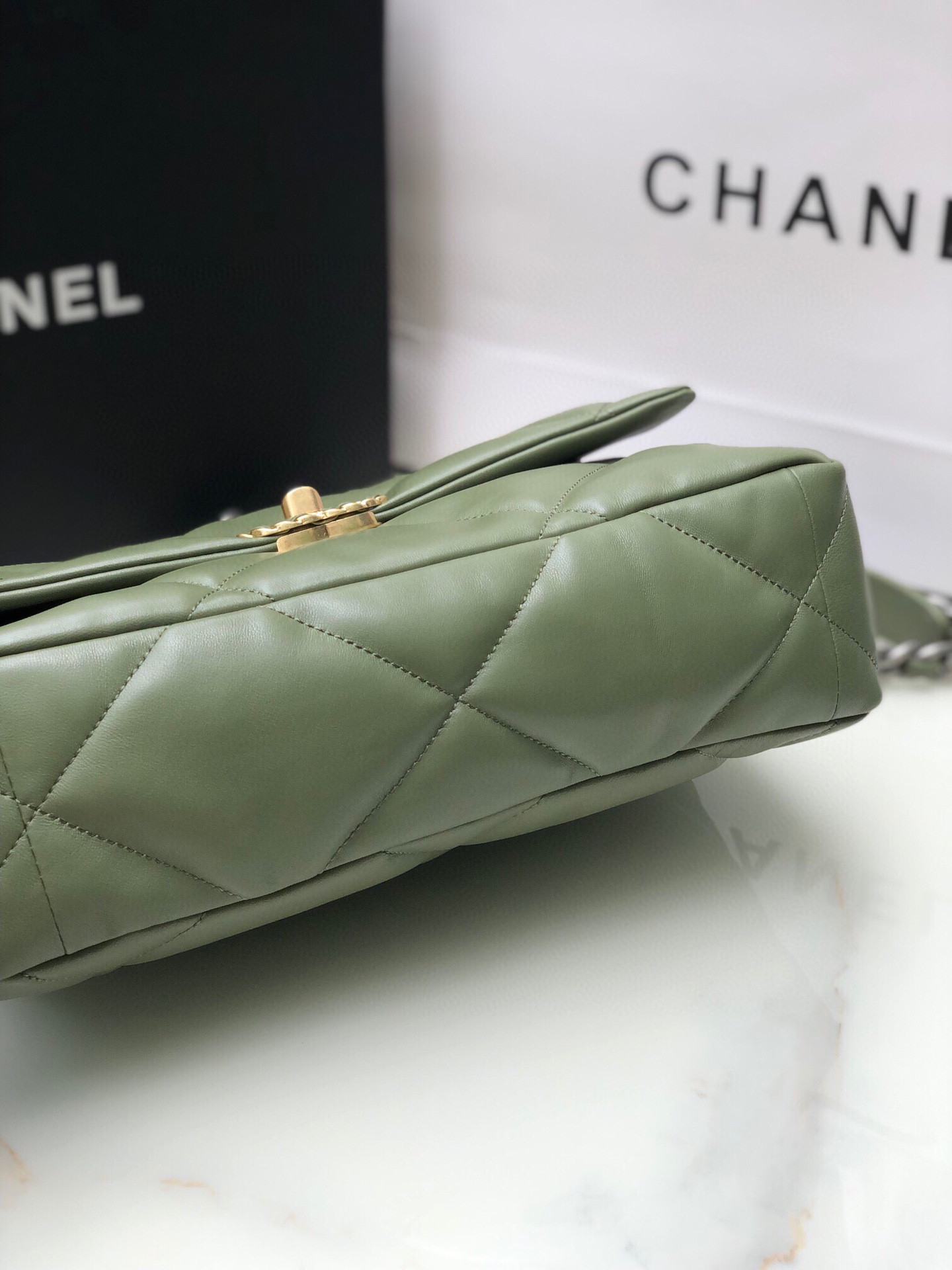 Ch*el 19 large handbag shiny leather, gold-tone, silver-tone & ruthenium-finish metal dark green 7.8 × 11.7 × 3.9 in