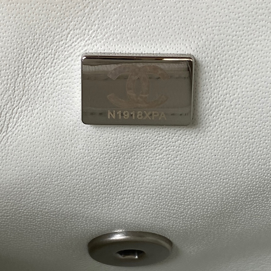 Ch*el mini flap bag shiny calfskin & silver-tone metal white 5.3 × 6.6 × 3.1 in