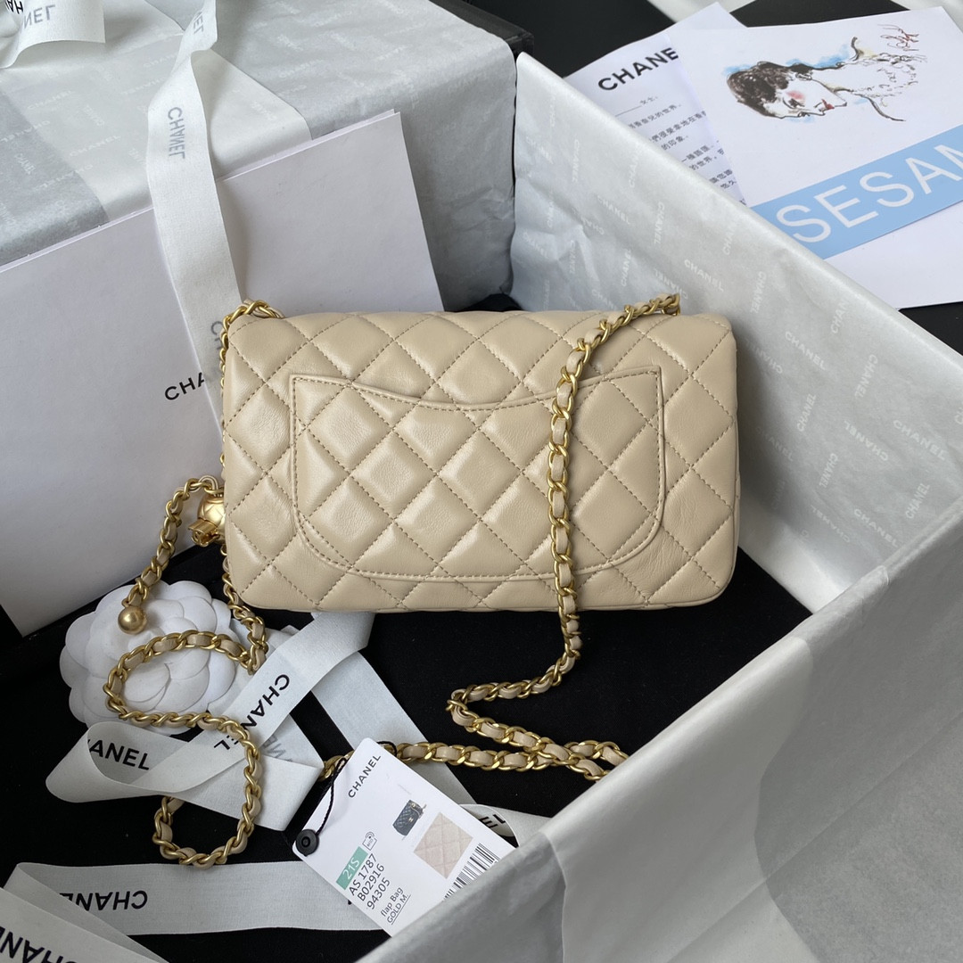 Ch*el mini flap bag shiny calfskin & gold-tone metal light beige 4.7 × 7.8 × 2.3 in