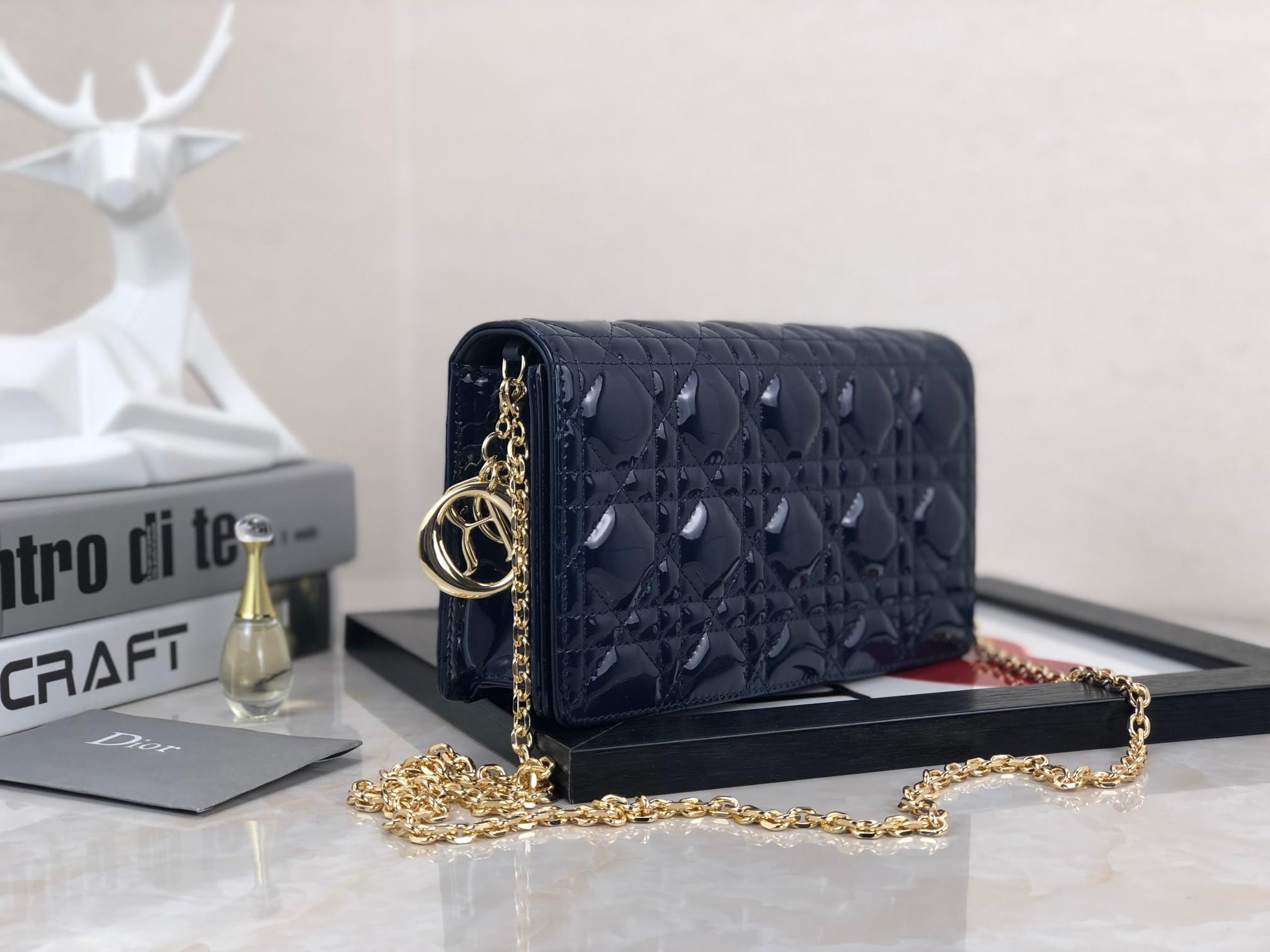 lady D*or pouch  navy patent cannage calfskin 8.5 x 4.5 x 1 inches