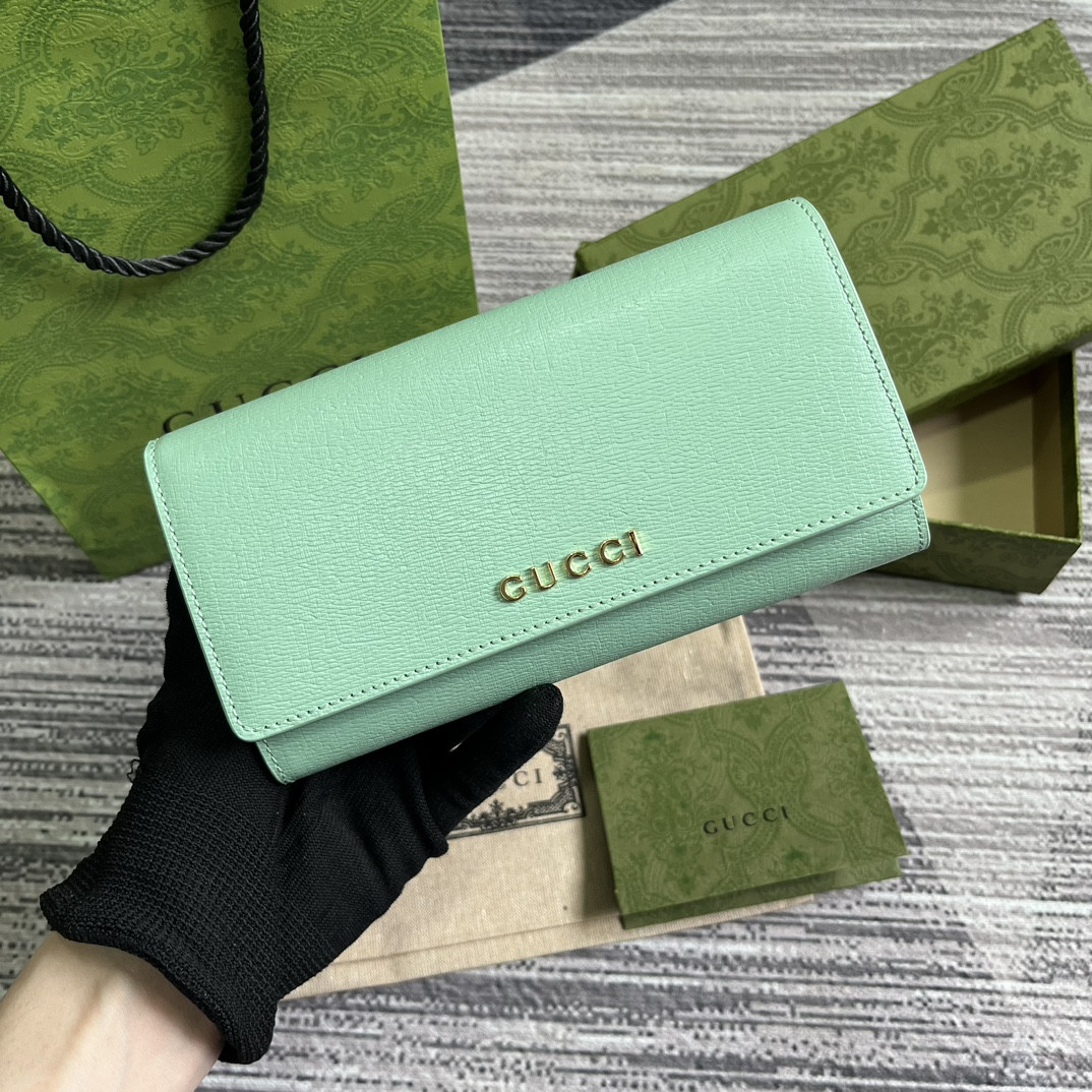 continental wallet with G*u*i script green 7.5"w x 4"h x 1.4"d