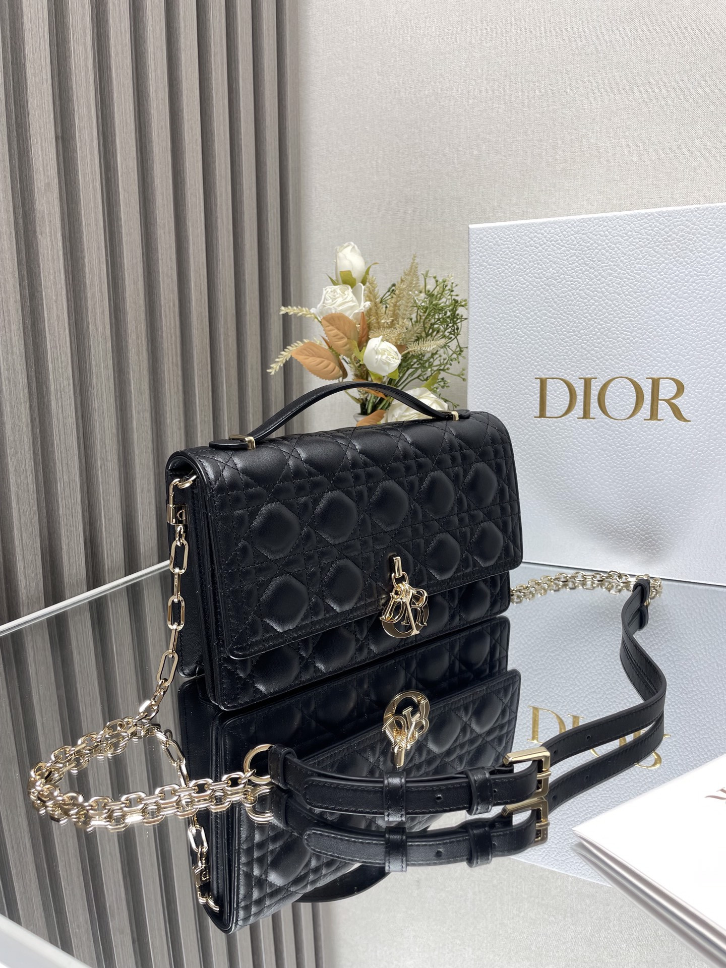 my D*or top handle bag black 9.5 x 5.5 x 3 inches