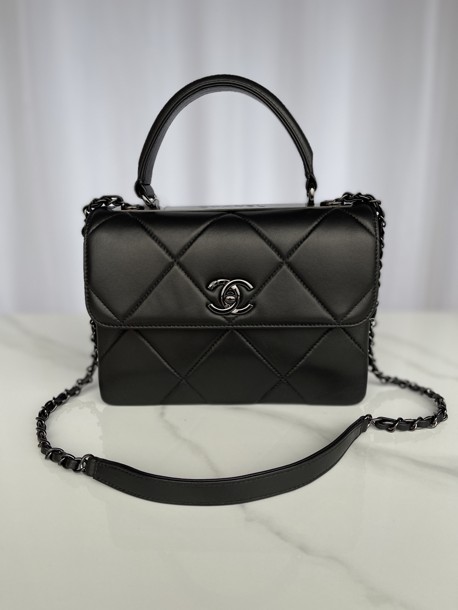 Ch*el flap bag with top handle 6.6 × 9.8 × 4.7 in