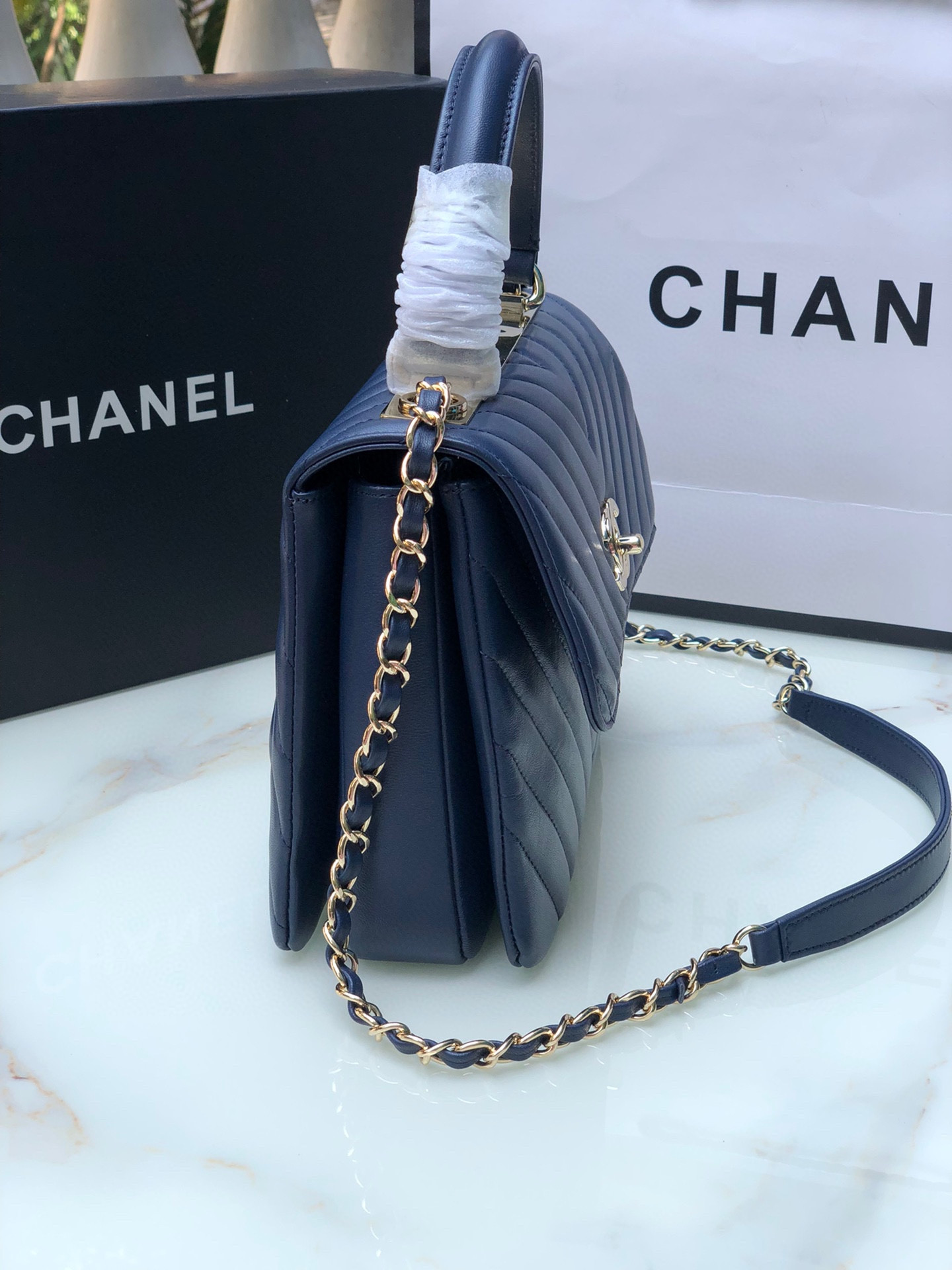 Ch*el flap bag with top handle navy 6.6 × 9.8 × 4.7 in