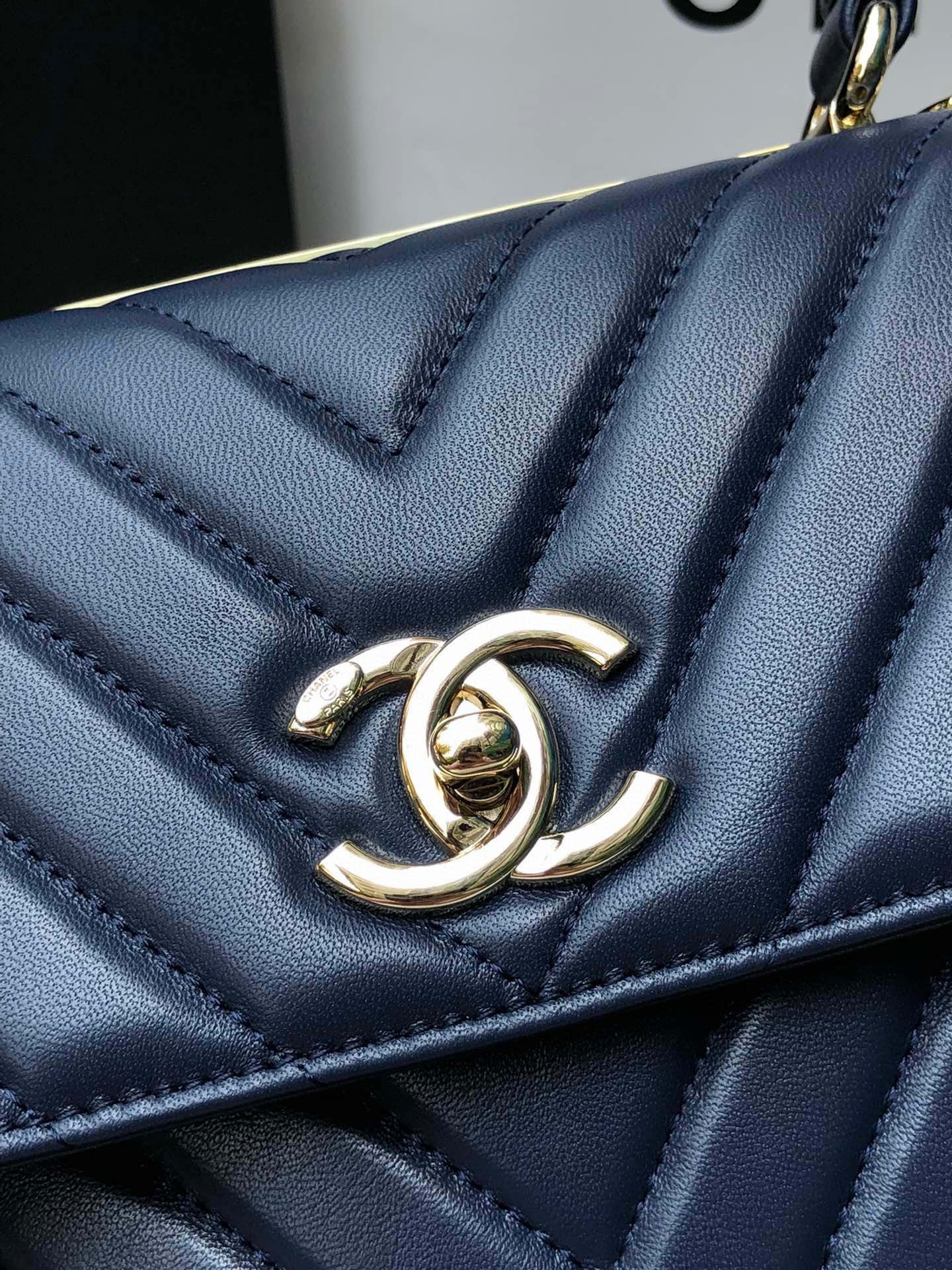 Ch*el flap bag with top handle navy 6.6 × 9.8 × 4.7 in