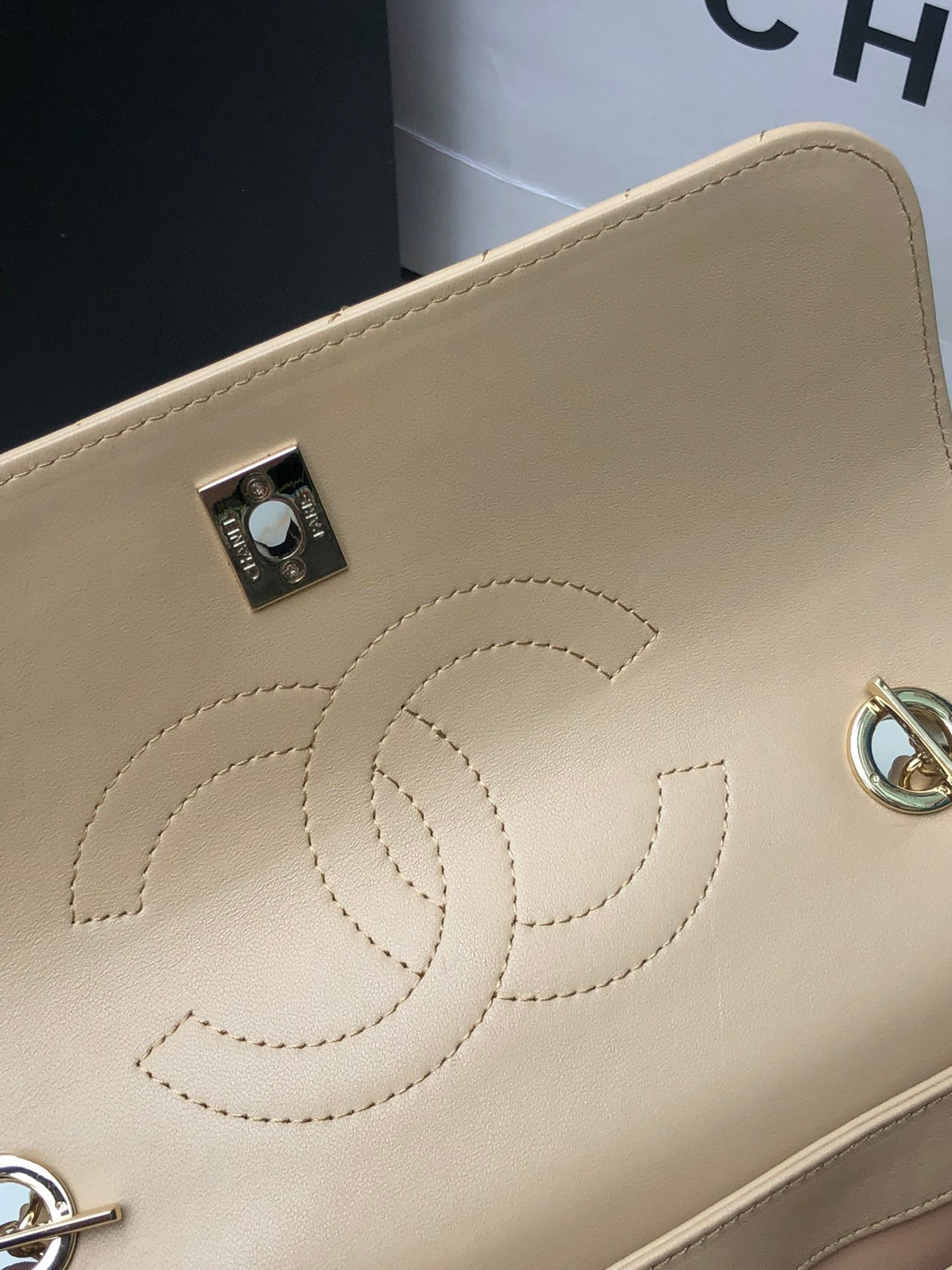 Ch*el flap bag with top handle beige 6.6 × 9.8 × 4.7 in