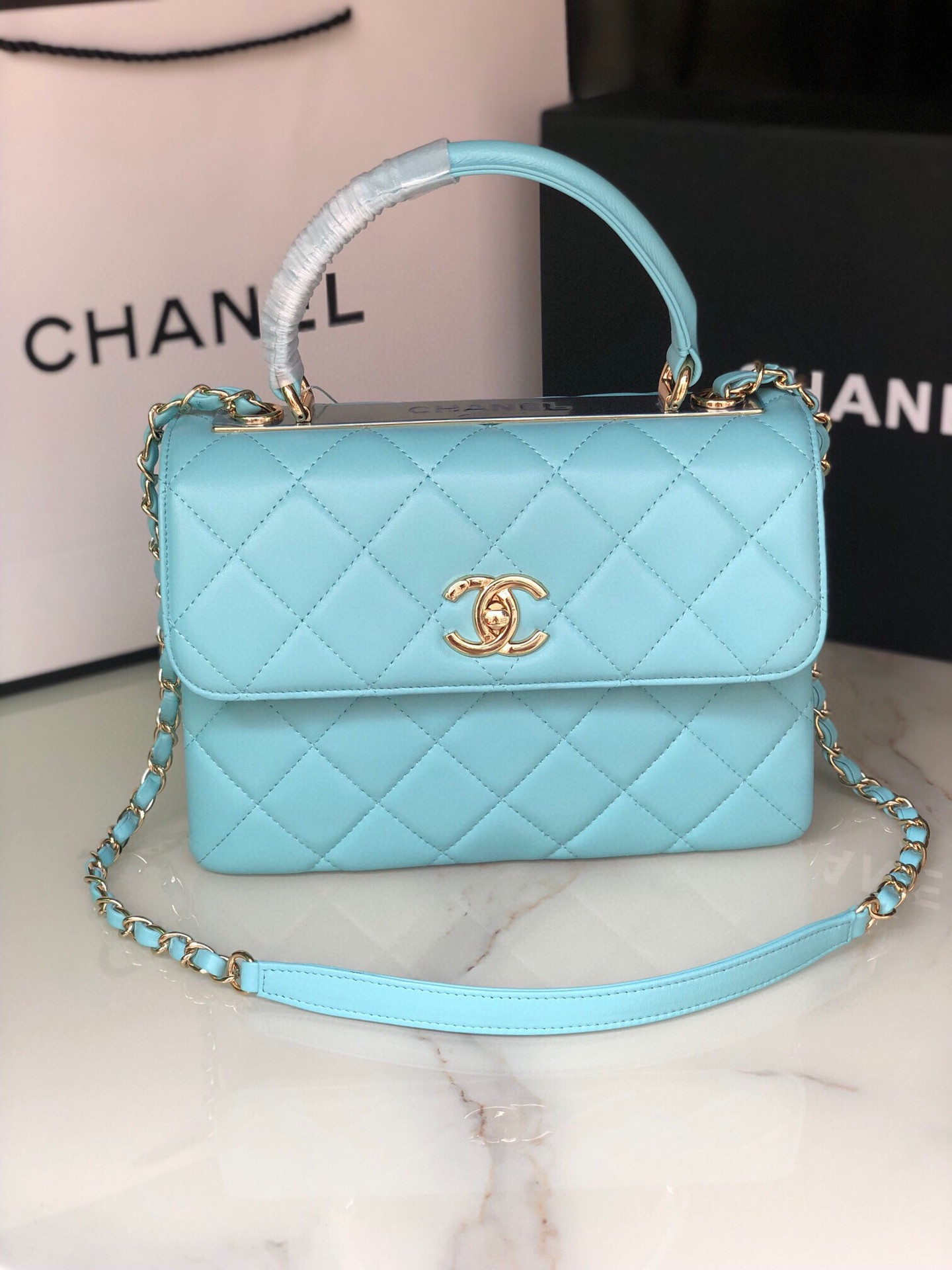 Ch*el flap bag with top handle 6.6 × 9.8 × 4.7 in