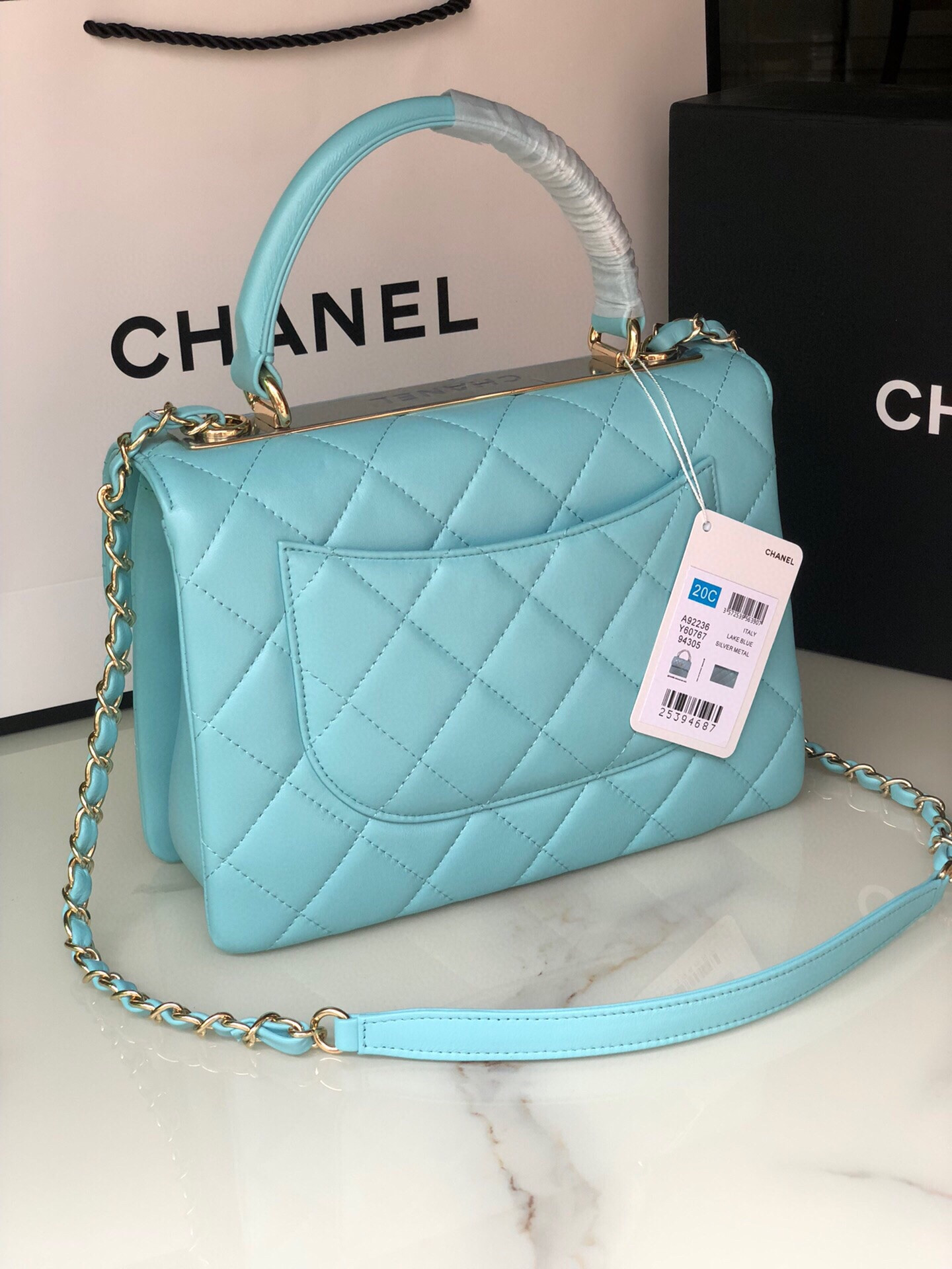Ch*el flap bag with top handle 6.6 × 9.8 × 4.7 in