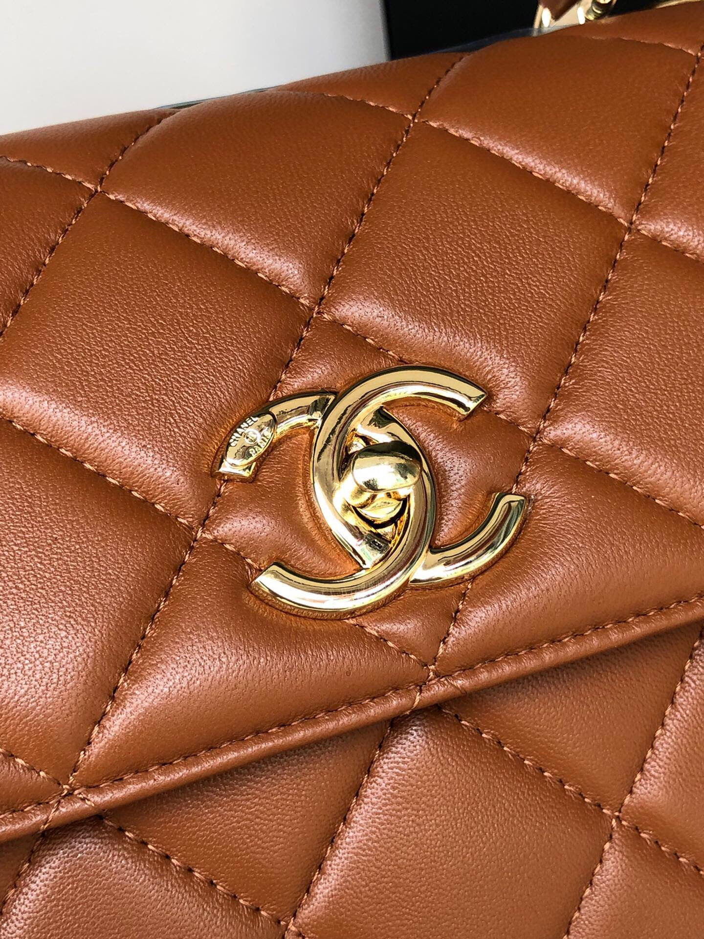 Ch*el flap bag with top handle 6.6 × 9.8 × 4.7 in