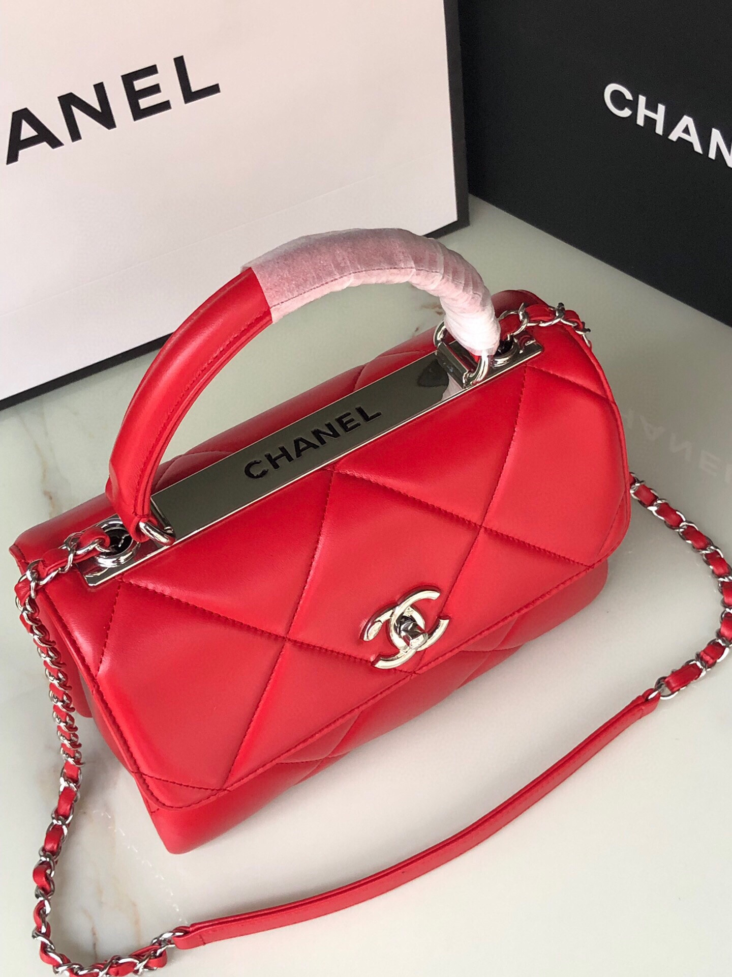 Ch*el flap bag with top handle 6.6 × 9.8 × 4.7 in
