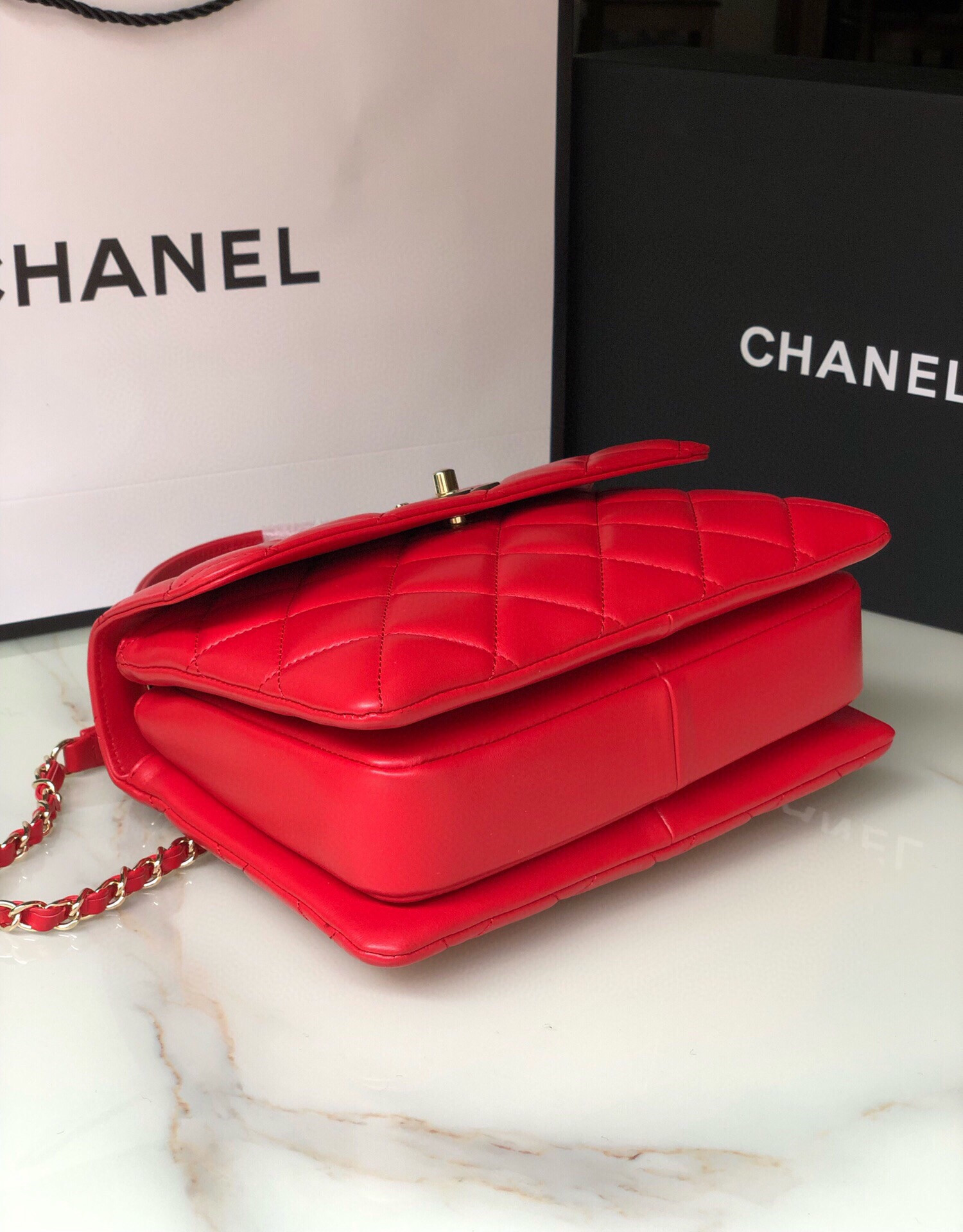 Ch*el flap bag with top handle 6.6 × 9.8 × 4.7 in