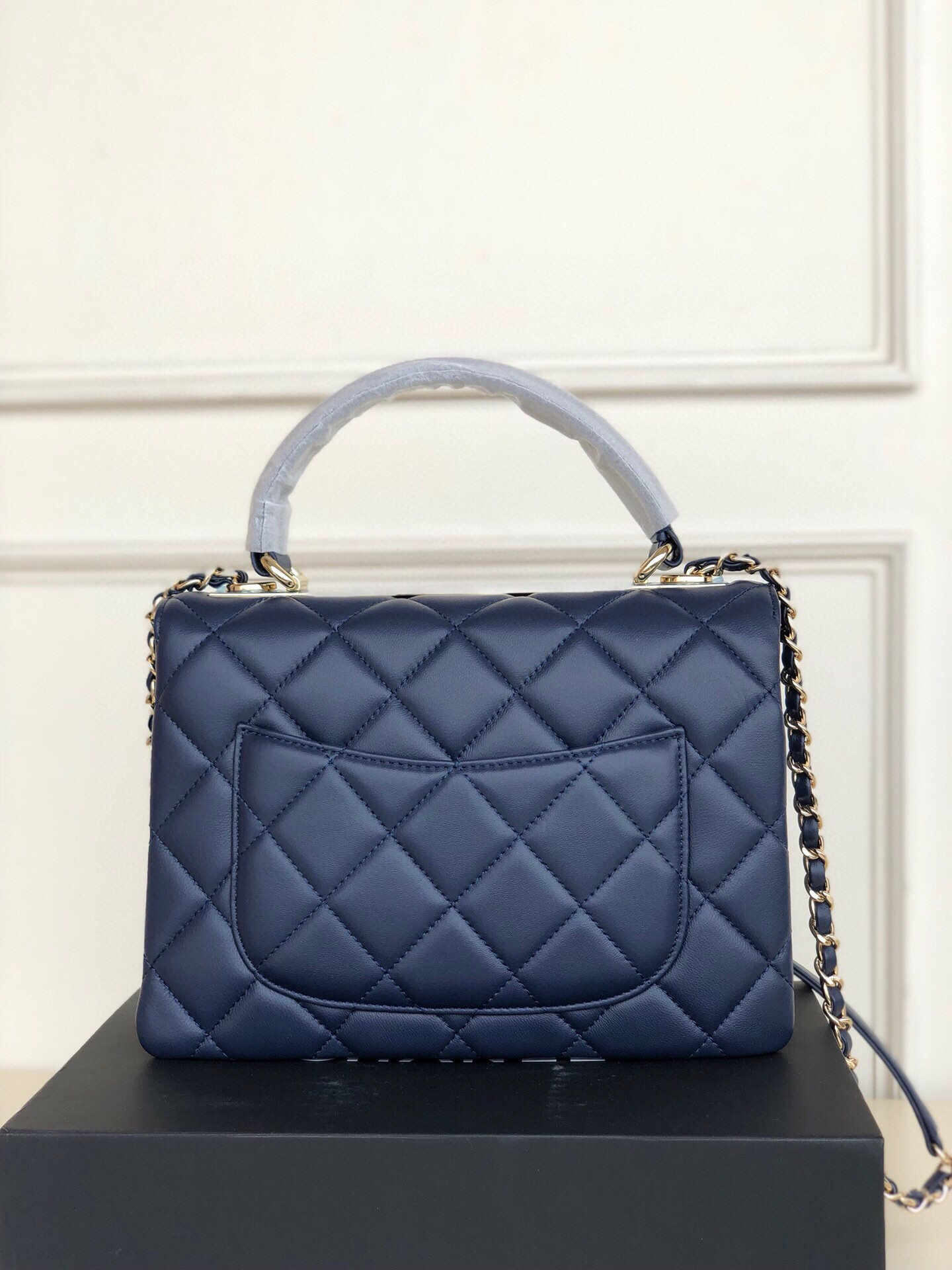 Ch*el flap bag with top handle 6.6 × 9.8 × 4.7 in