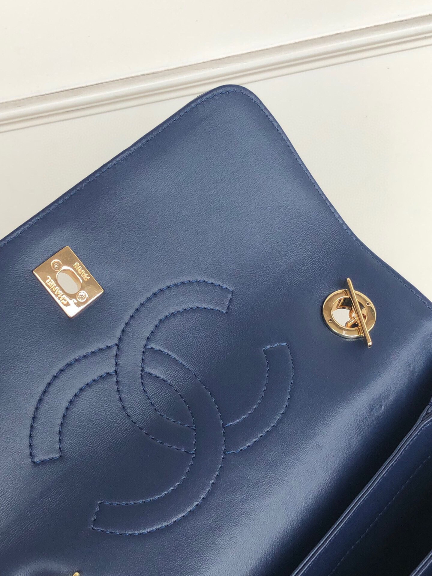 Ch*el flap bag with top handle 6.6 × 9.8 × 4.7 in