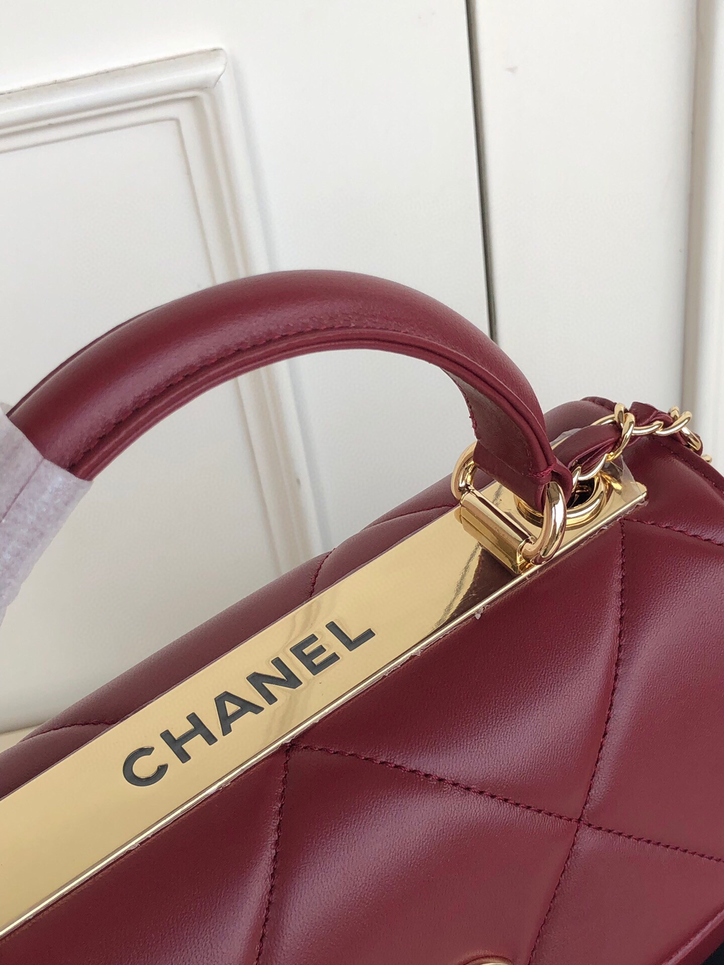 Ch*el flap bag with top handle 6.6 × 9.8 × 4.7 in