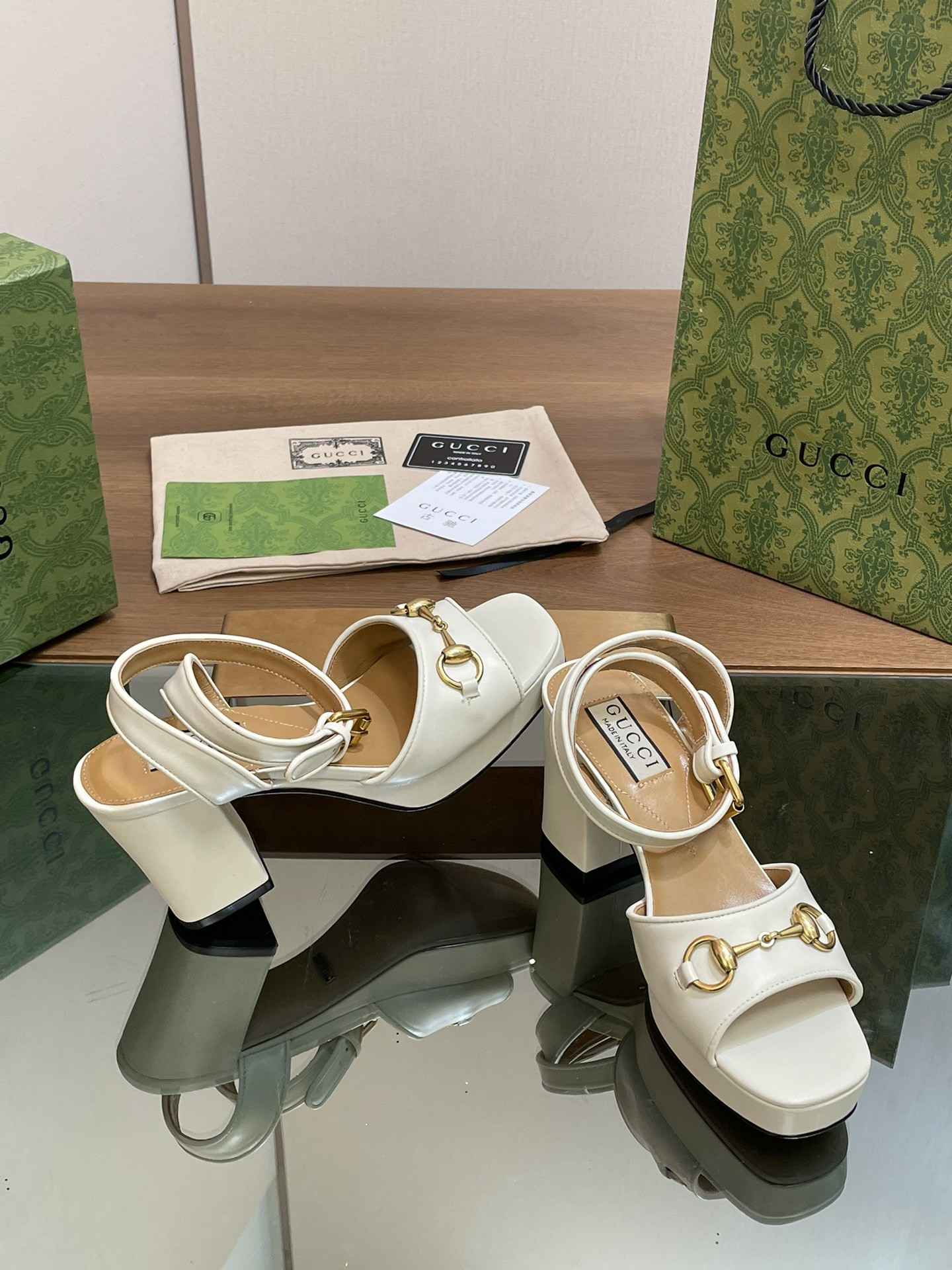 ua G*u*i horsebit platform sandal