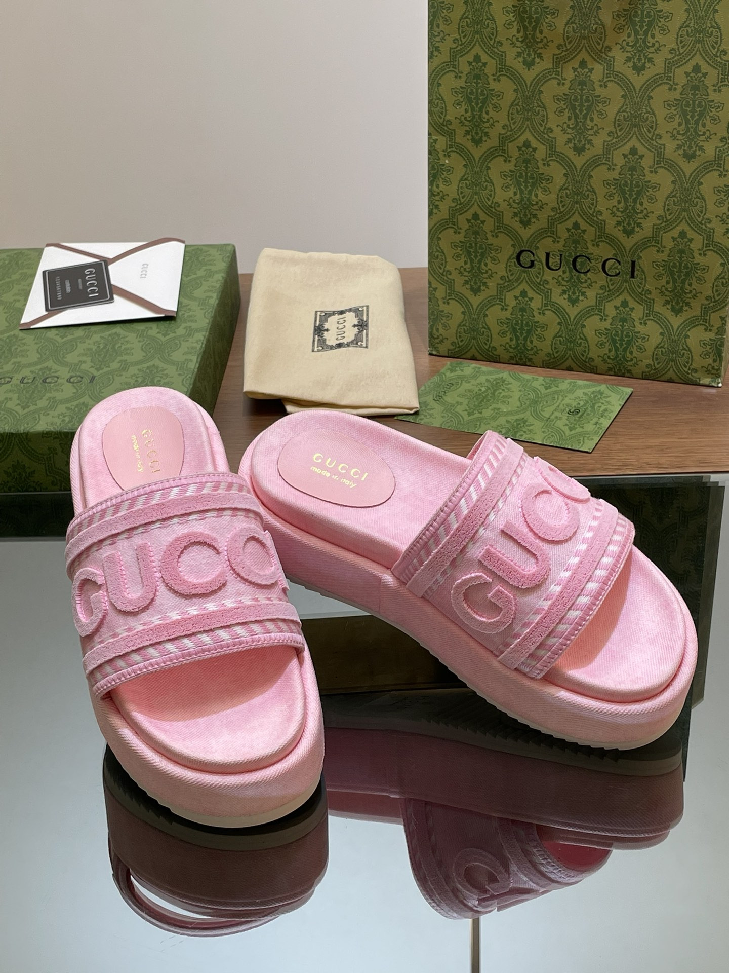ua G*u*i slide sandal with G*u*i script