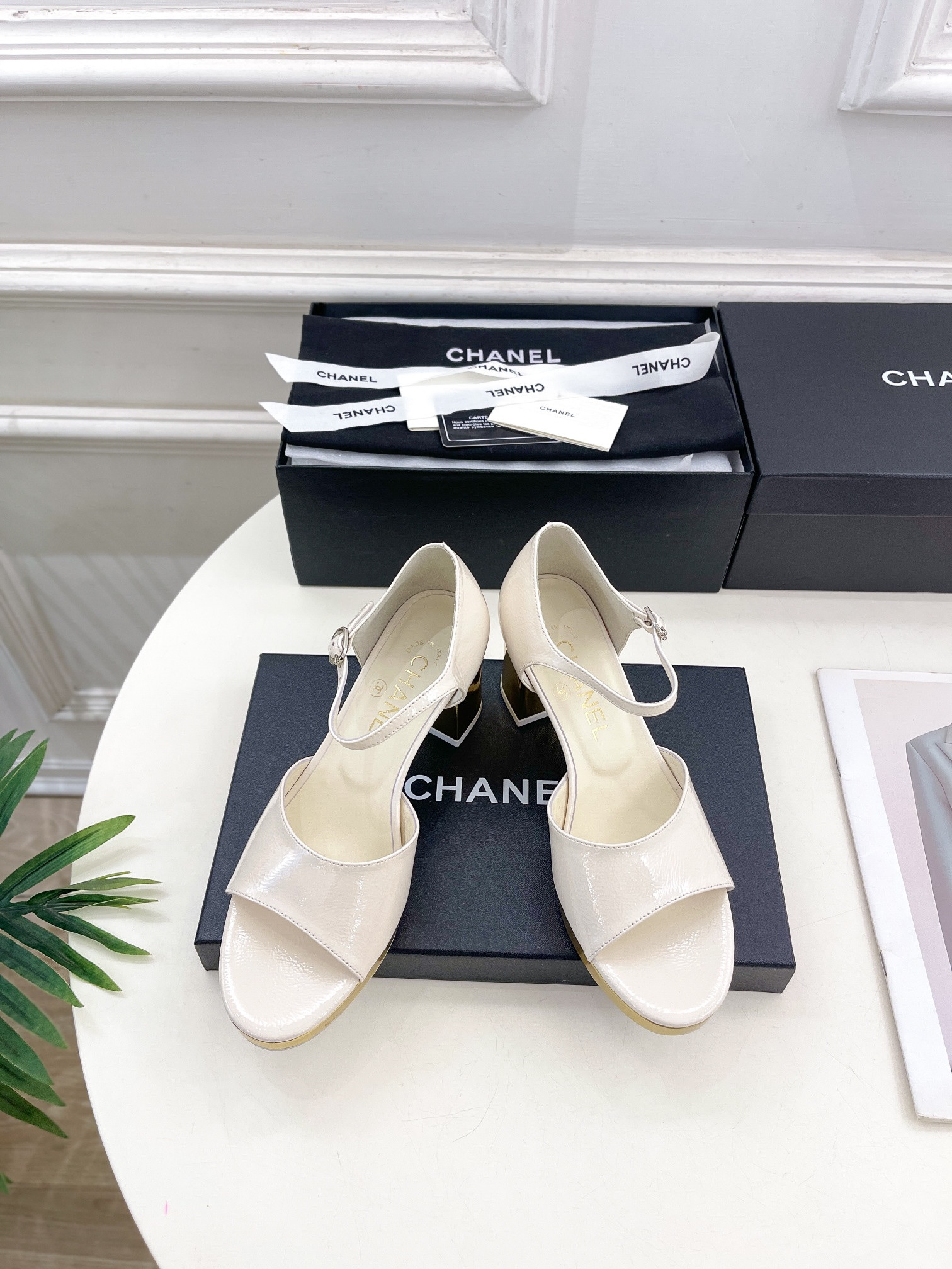 ua Ch*el heeled sandals