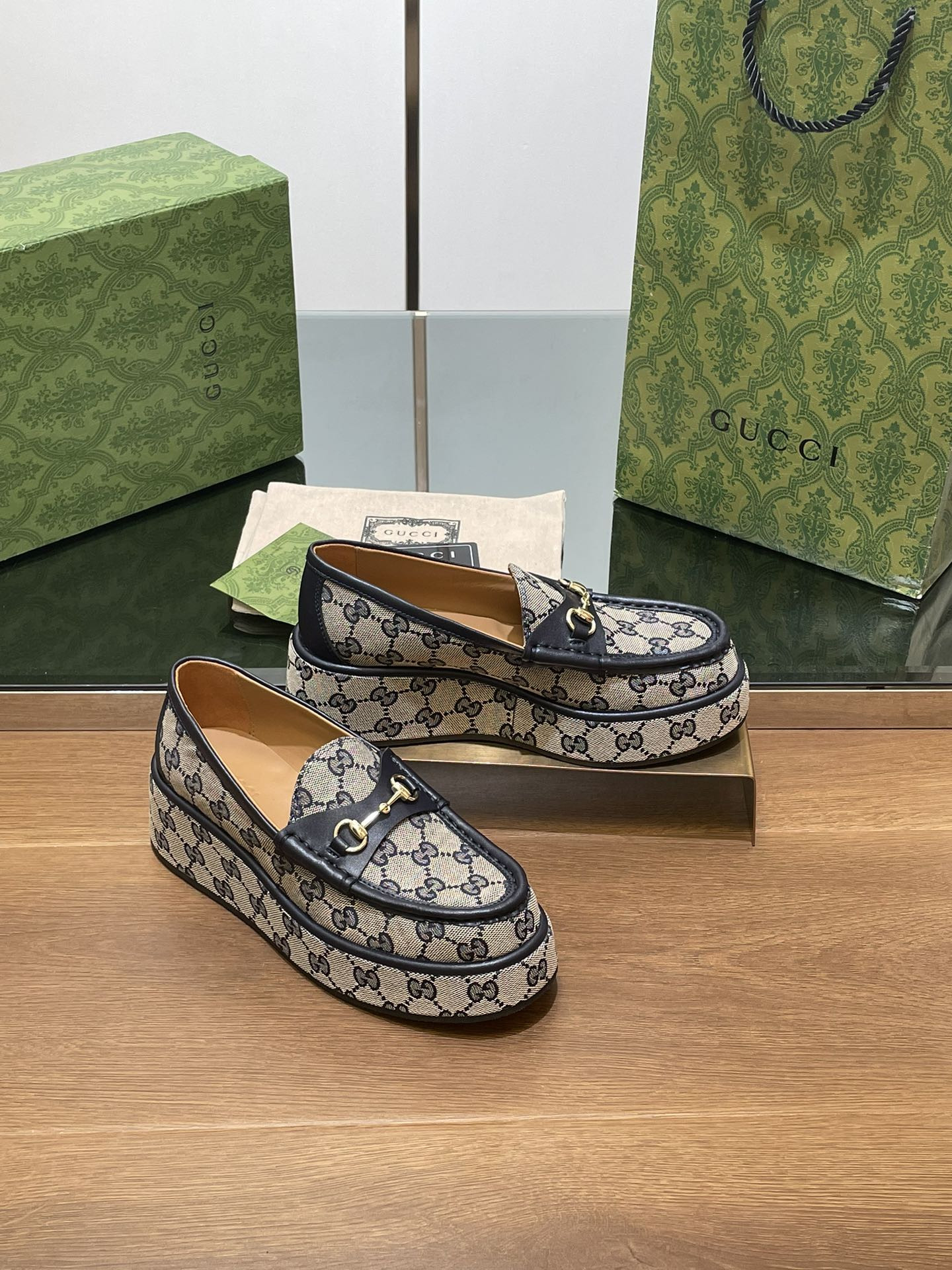 ua G*u*i horsebit wedge loafer