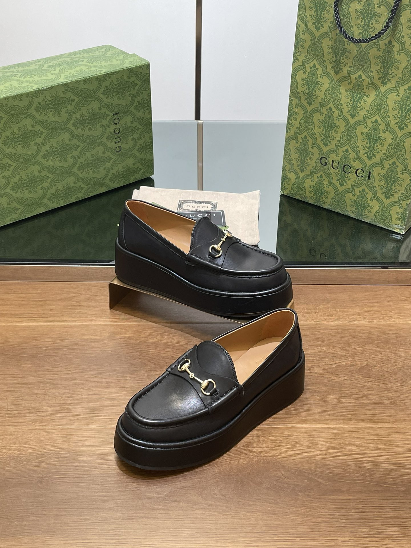 ua G*u*i horsebit wedge loafer