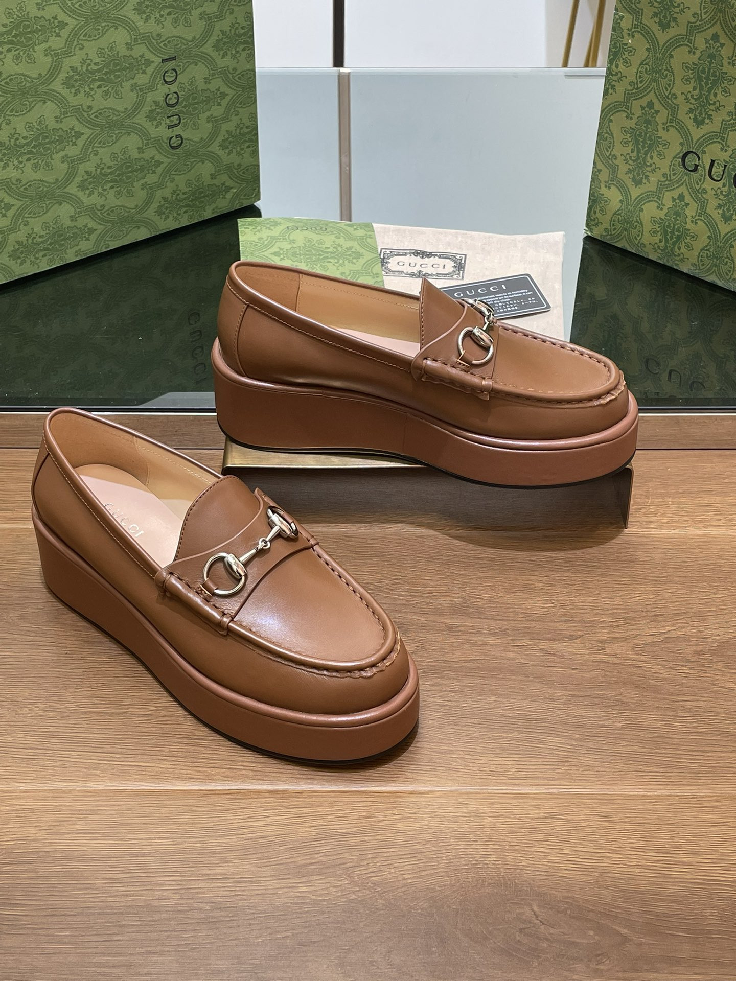 ua G*u*i horsebit wedge loafer
