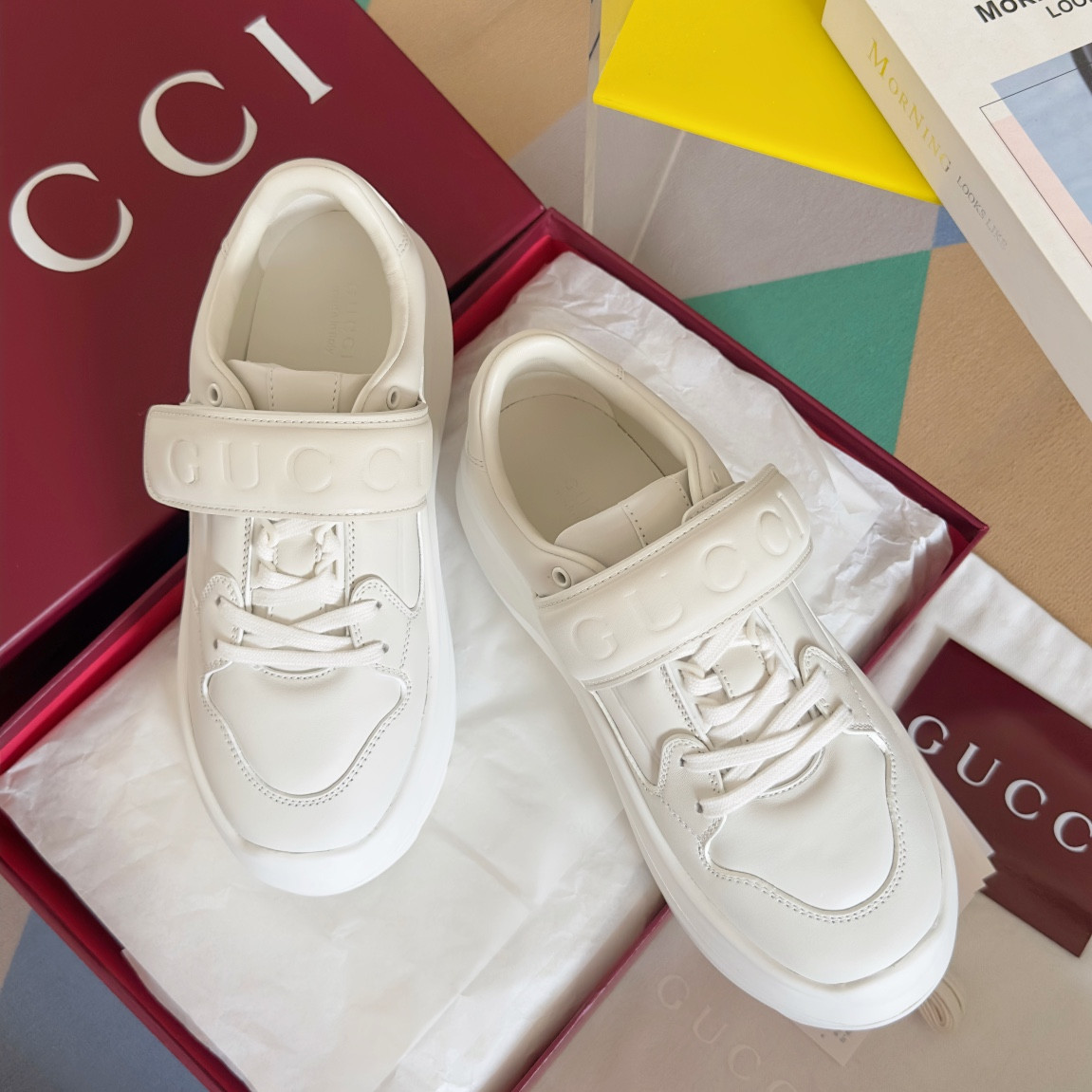 ua G*u*i wave wedge sneaker